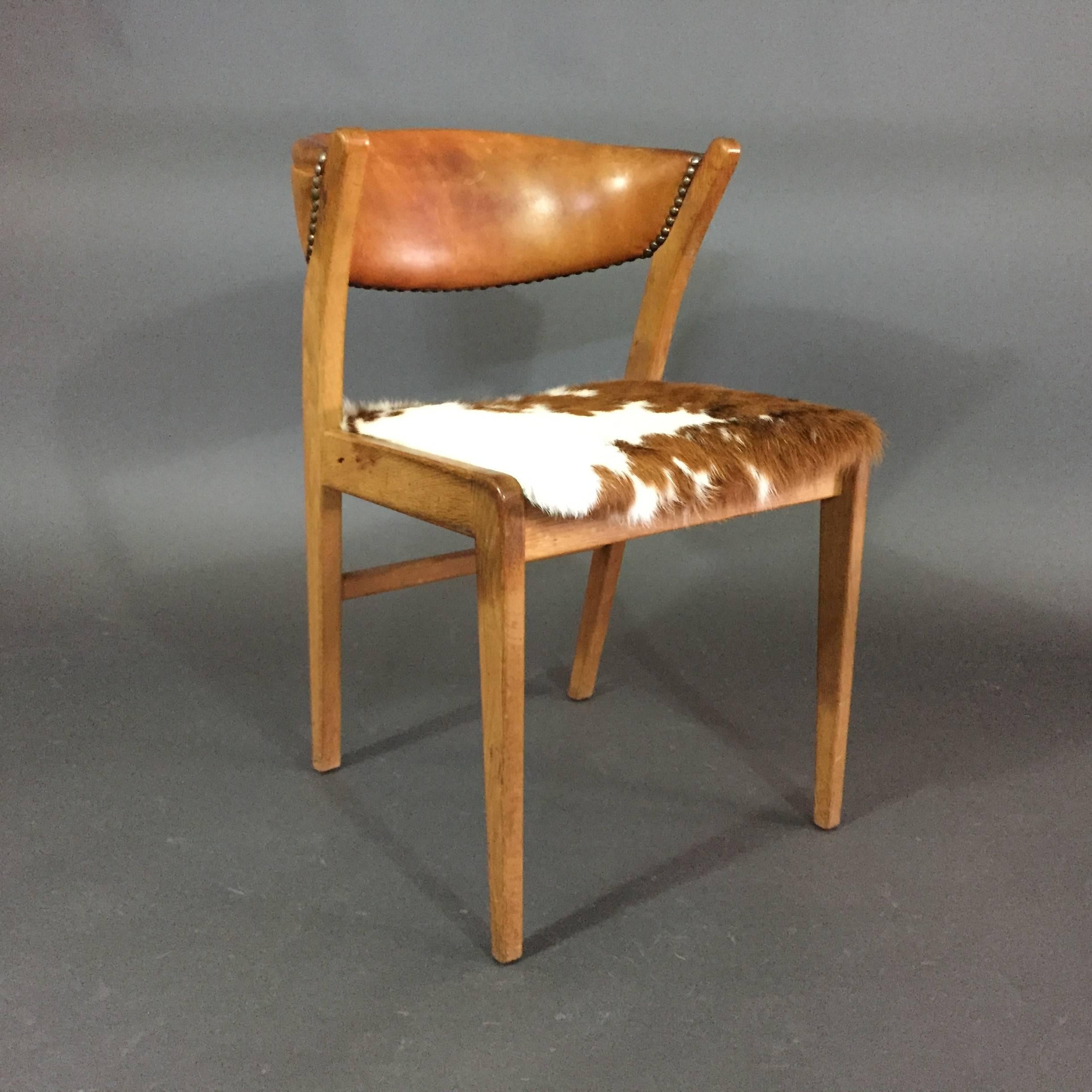 Four Danish 1960s Oak, Leather and Cowhide Dining Chairs 5