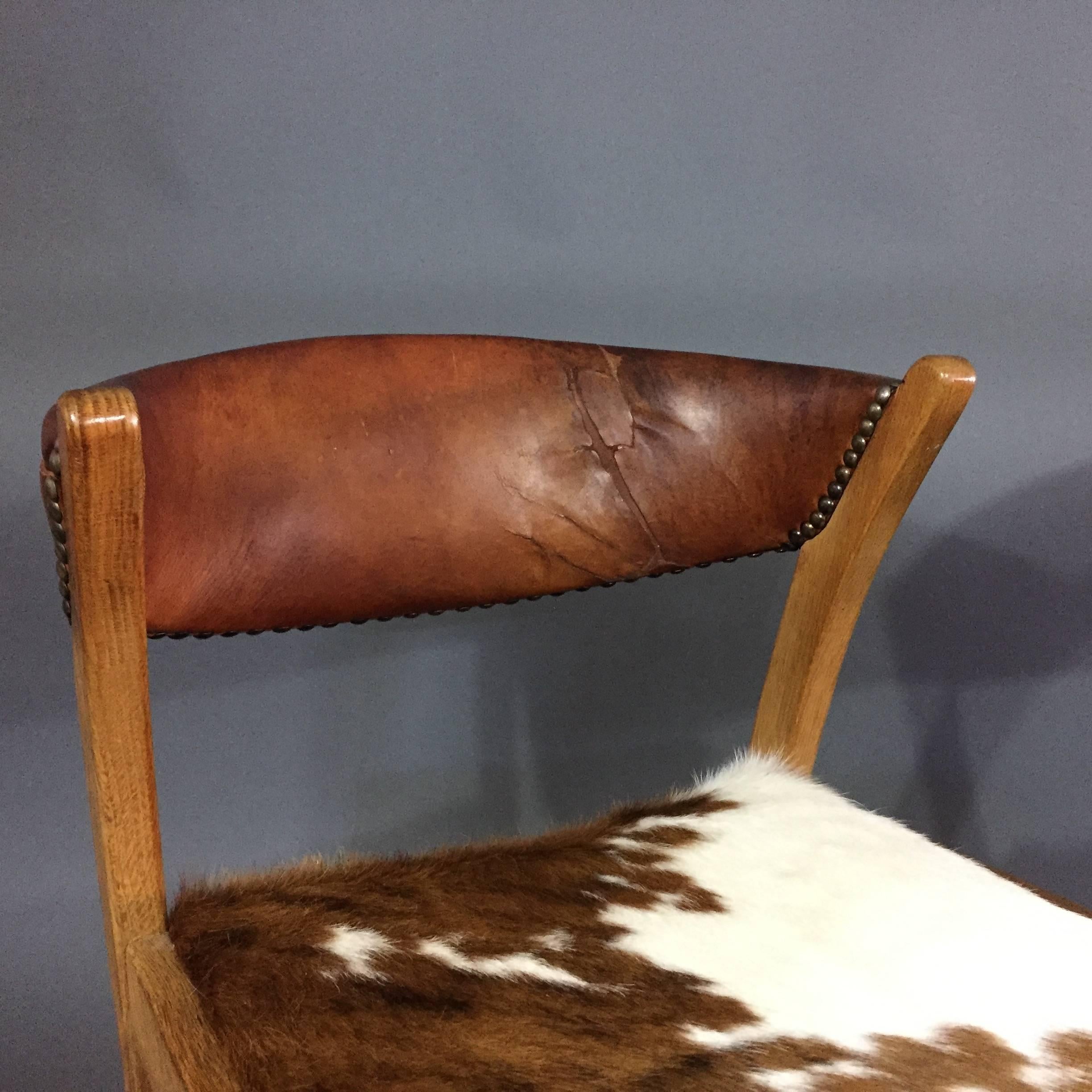 Mid-20th Century Four Danish 1960s Oak, Leather and Cowhide Dining Chairs