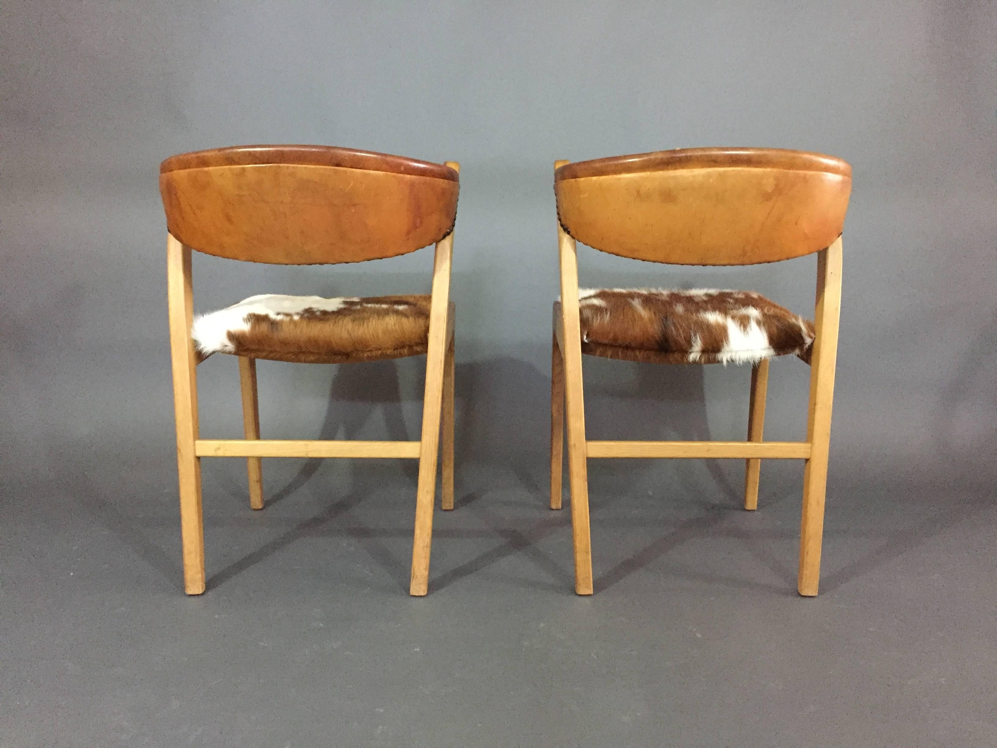 Four Danish 1960s Oak, Leather and Cowhide Dining Chairs 4