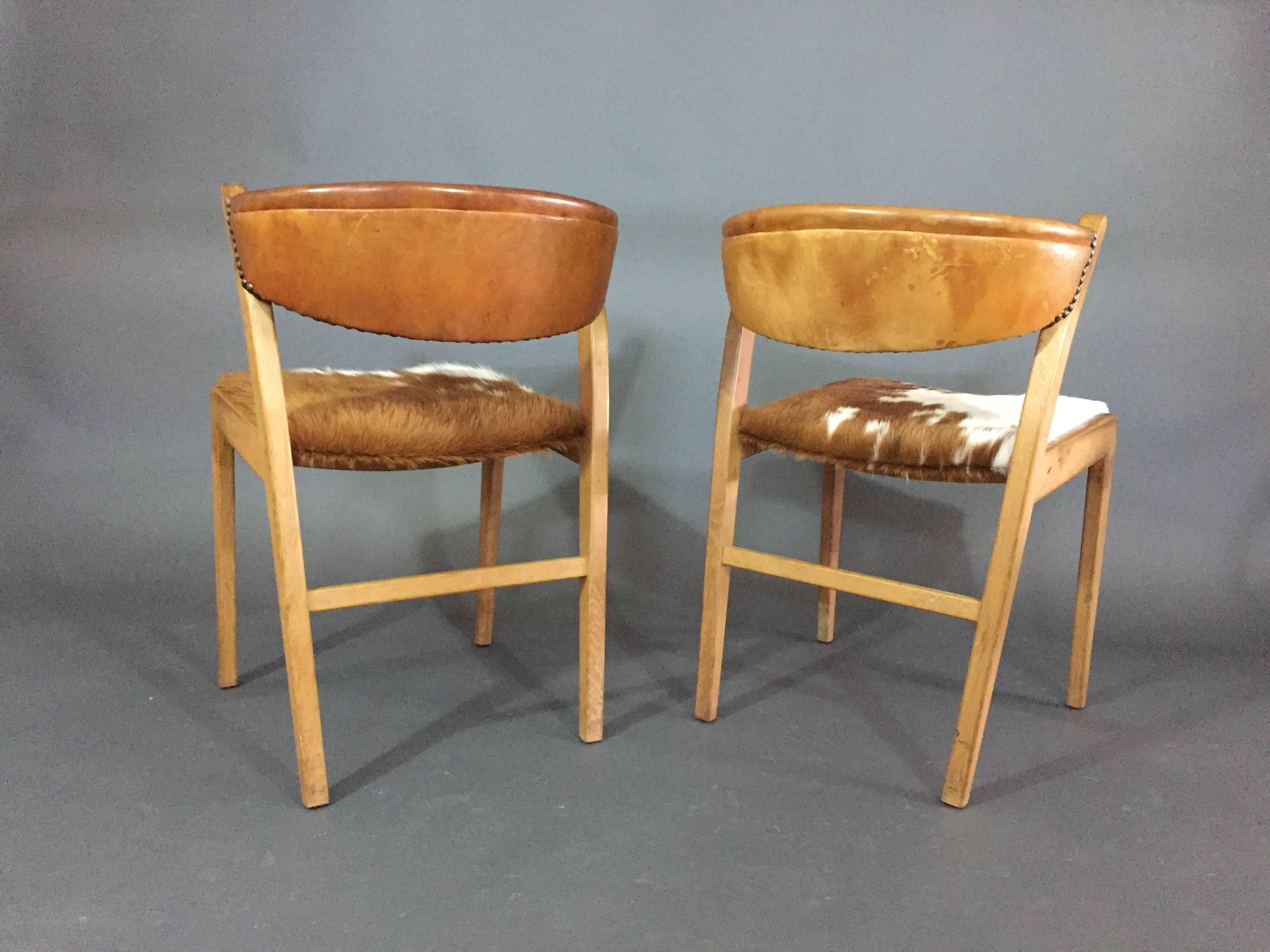 Four Danish 1960s Oak, Leather and Cowhide Dining Chairs 3