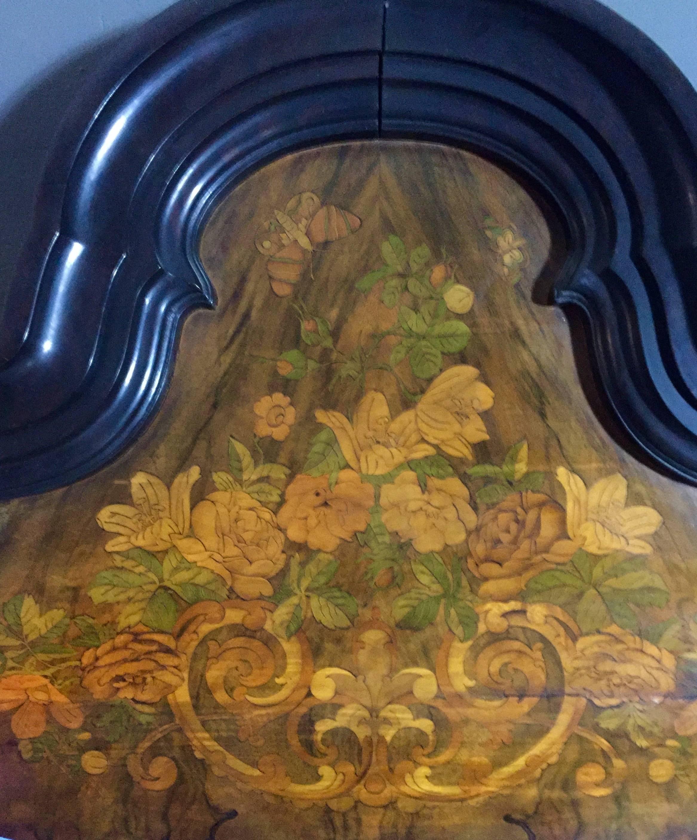 A wonderful large-scale (6 1/2 feet tall) standing mirror with beveled and contour capital over exquisite hand marquetry around entire mirror frame in delicate colors of flowers, birds, butterfly, scroll and swag, walnut veneer, in the Karl XV