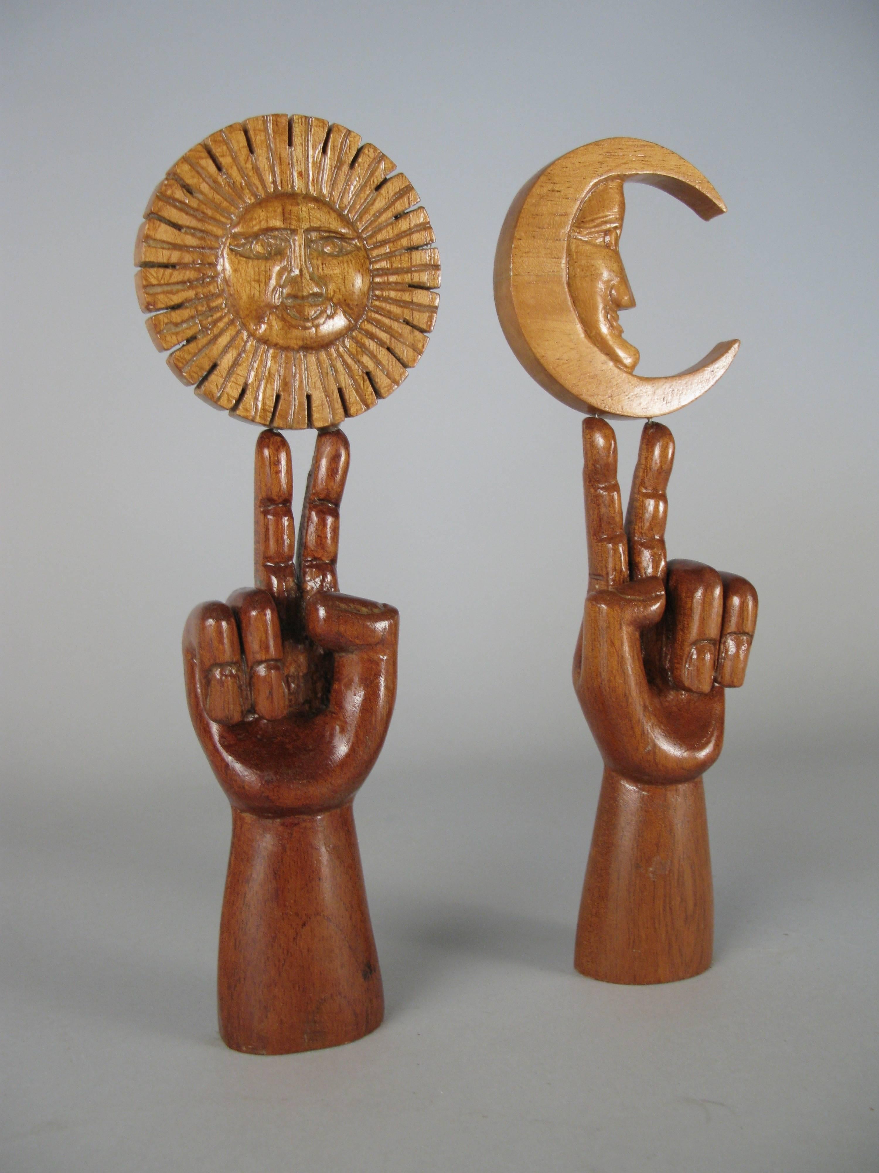 A pair of celebrated and surrealist sculptures, titled 
