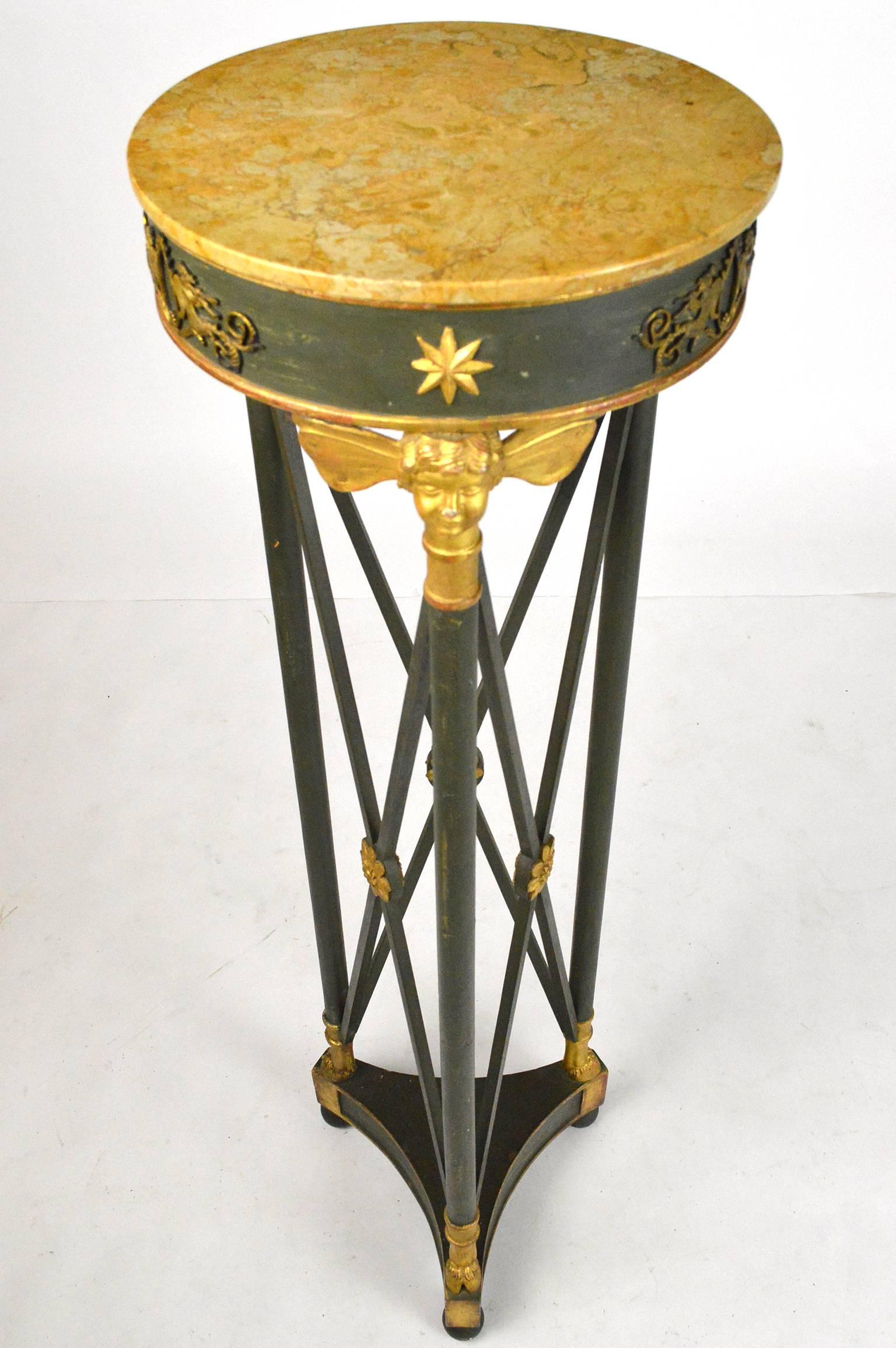 French Empire style gilt and painted wood pedestal beautifully carved having gilt bronze mount around top with original marble top.