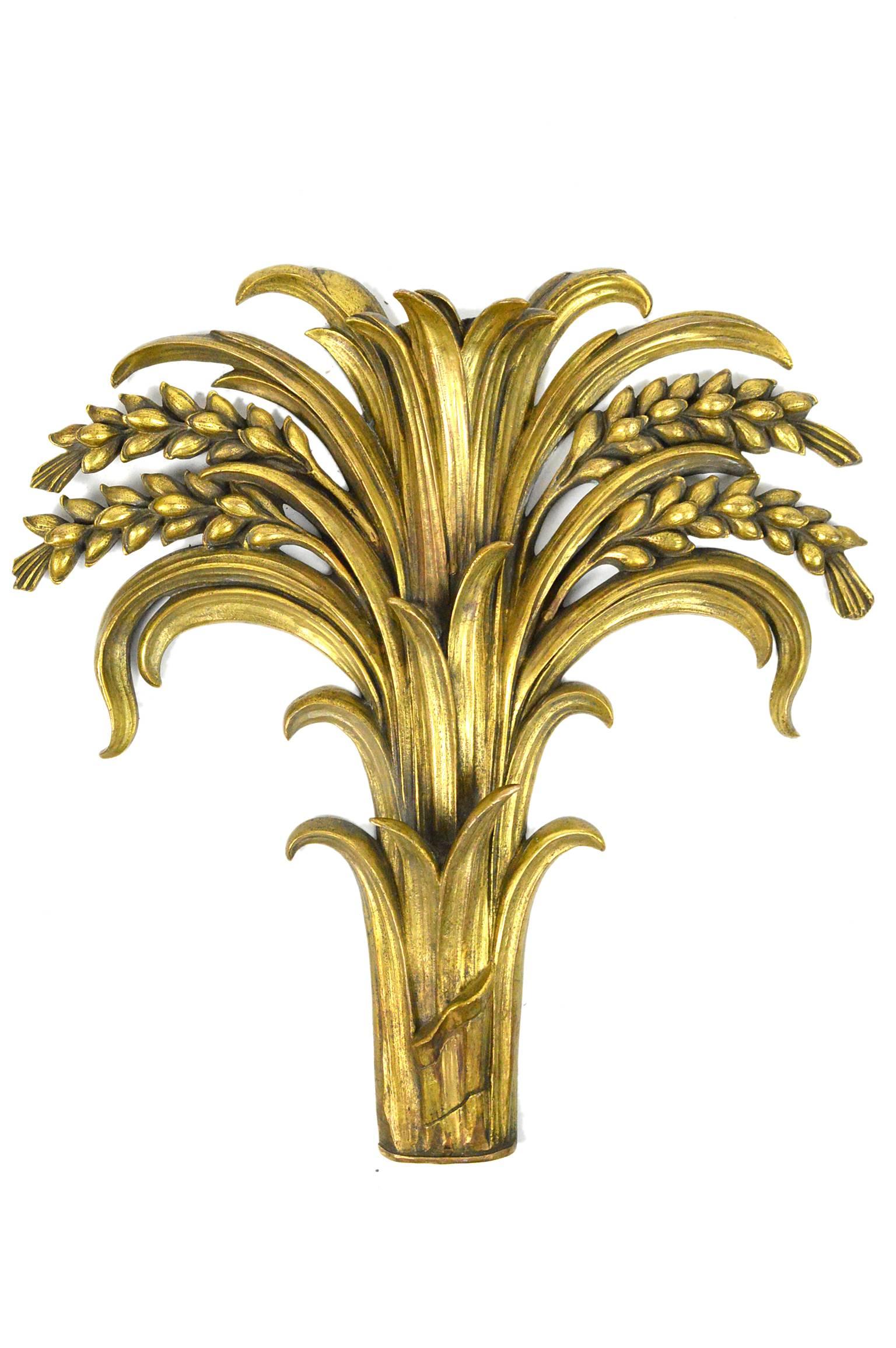 Pair of French deco gilt bronze architectural elements with finely cast details and beautiful patina.
