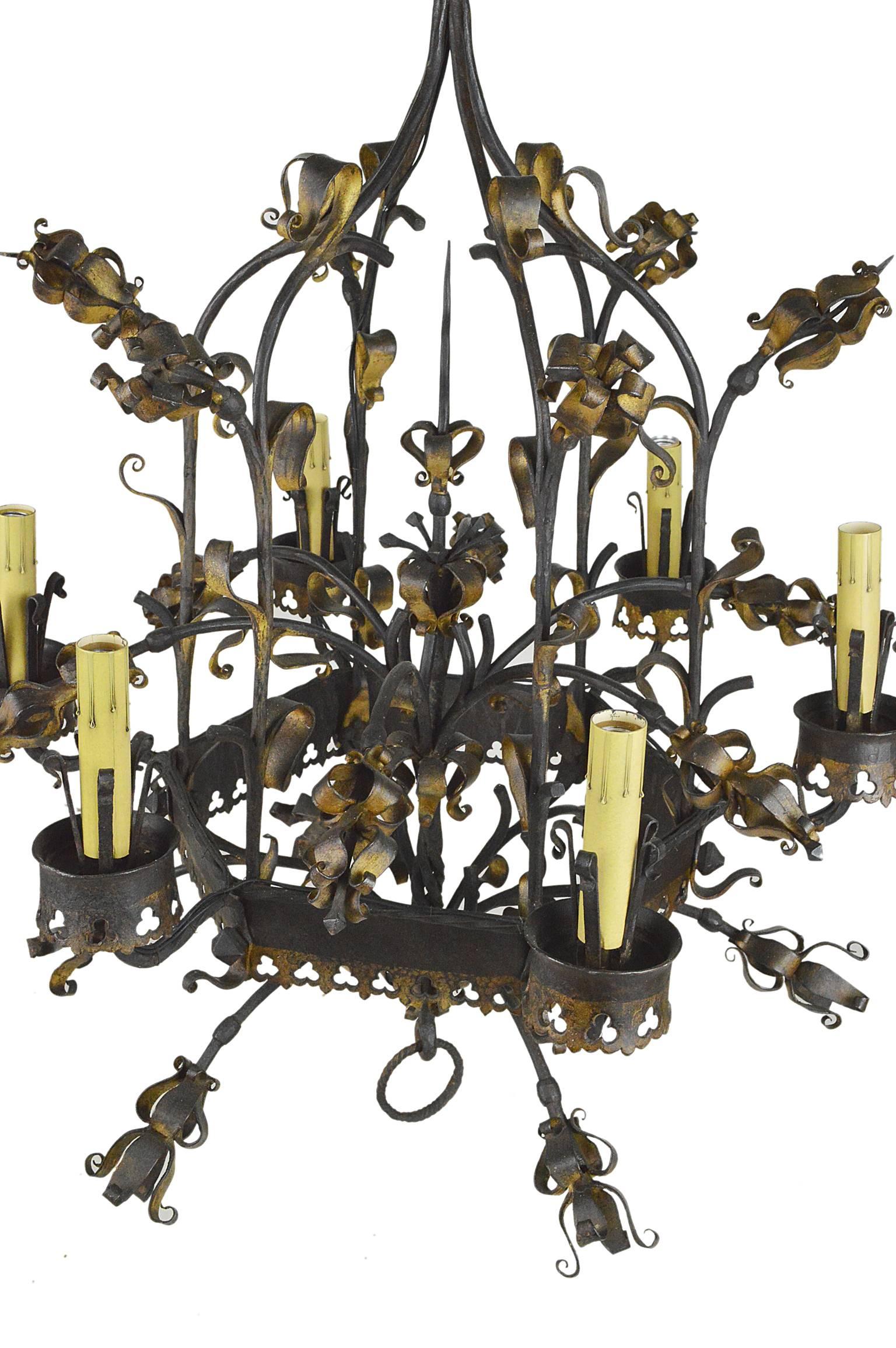 A fine 19th century French Renaissance style wrought iron and gilt six light with beautiful hand-wrought and hand-forged work throughout. Having original patina, completely cleaned and re-wired.