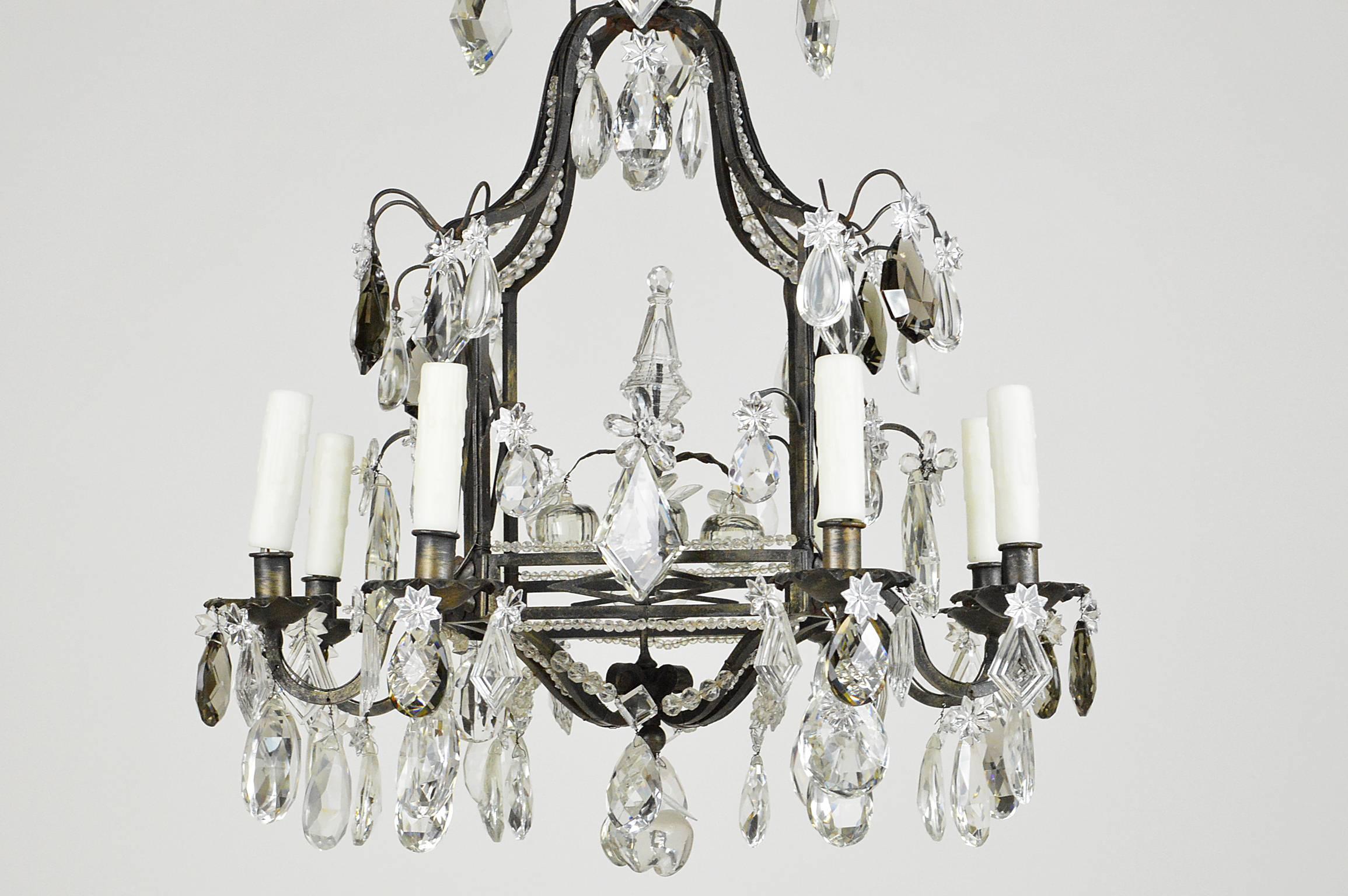 Fine French iron and crystal eight-light cage form chandelier having beaded decoration throughout the frame with colored and clear crystals throughout. This fixture is of the finest quality. Cleaned and recently rewired.