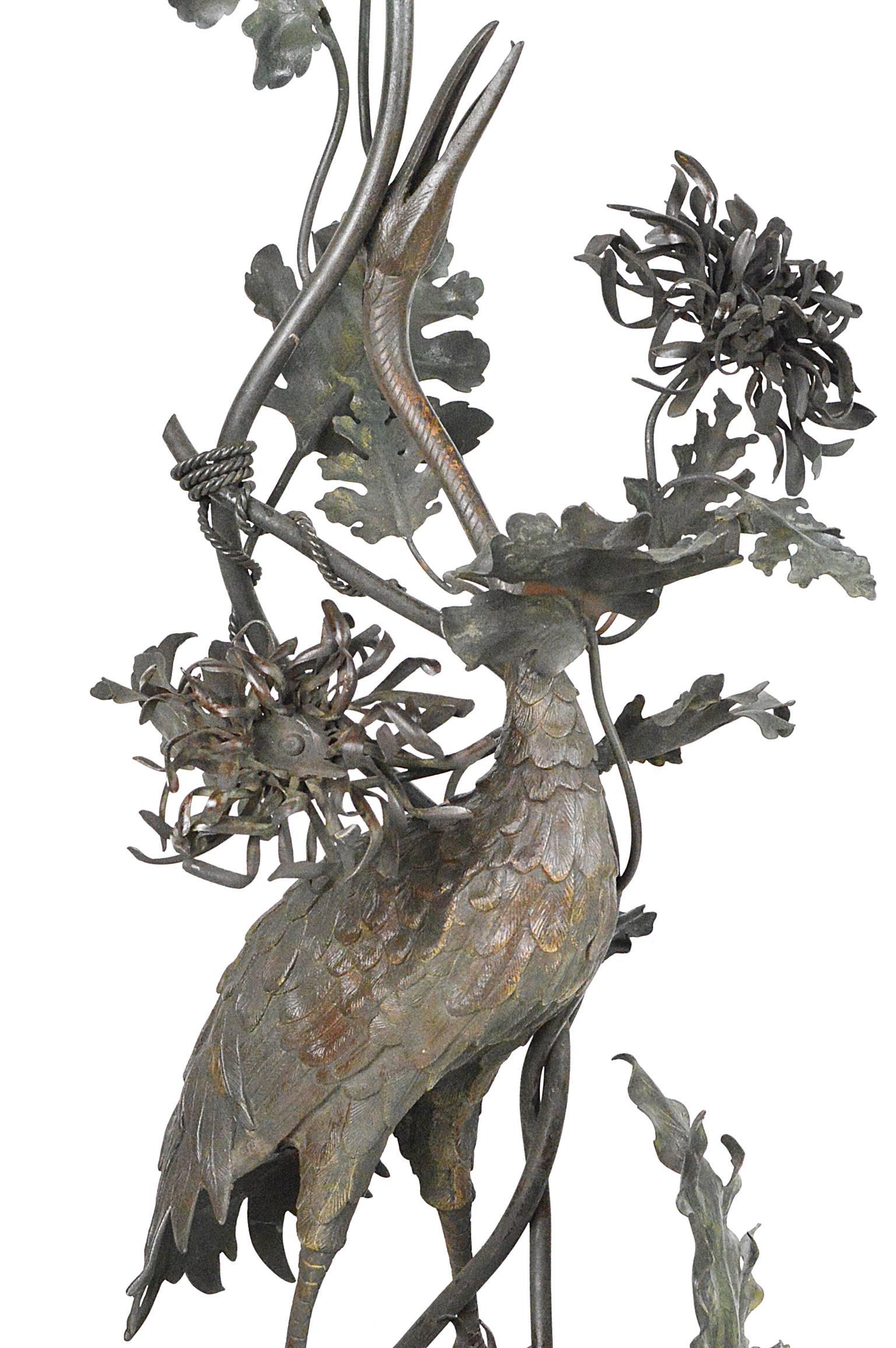 Austrian bronze floor lamp with detailed egret surrounded by large leaves and foliage.
Provenance: From an Iris Apfel decorated estate.
Measures: 61