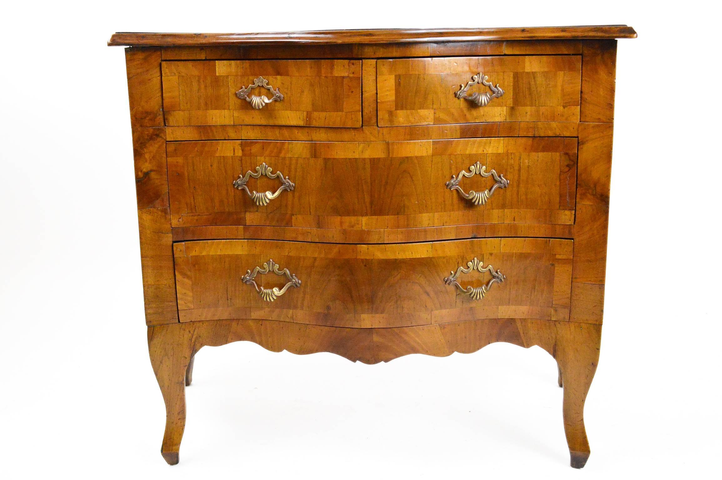 Italian veneered olivewood bombe three-drawer chest.