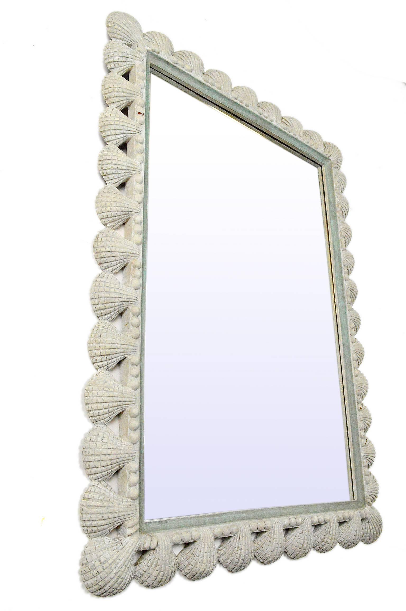 Italian carved wood shell mirror with painted finish.