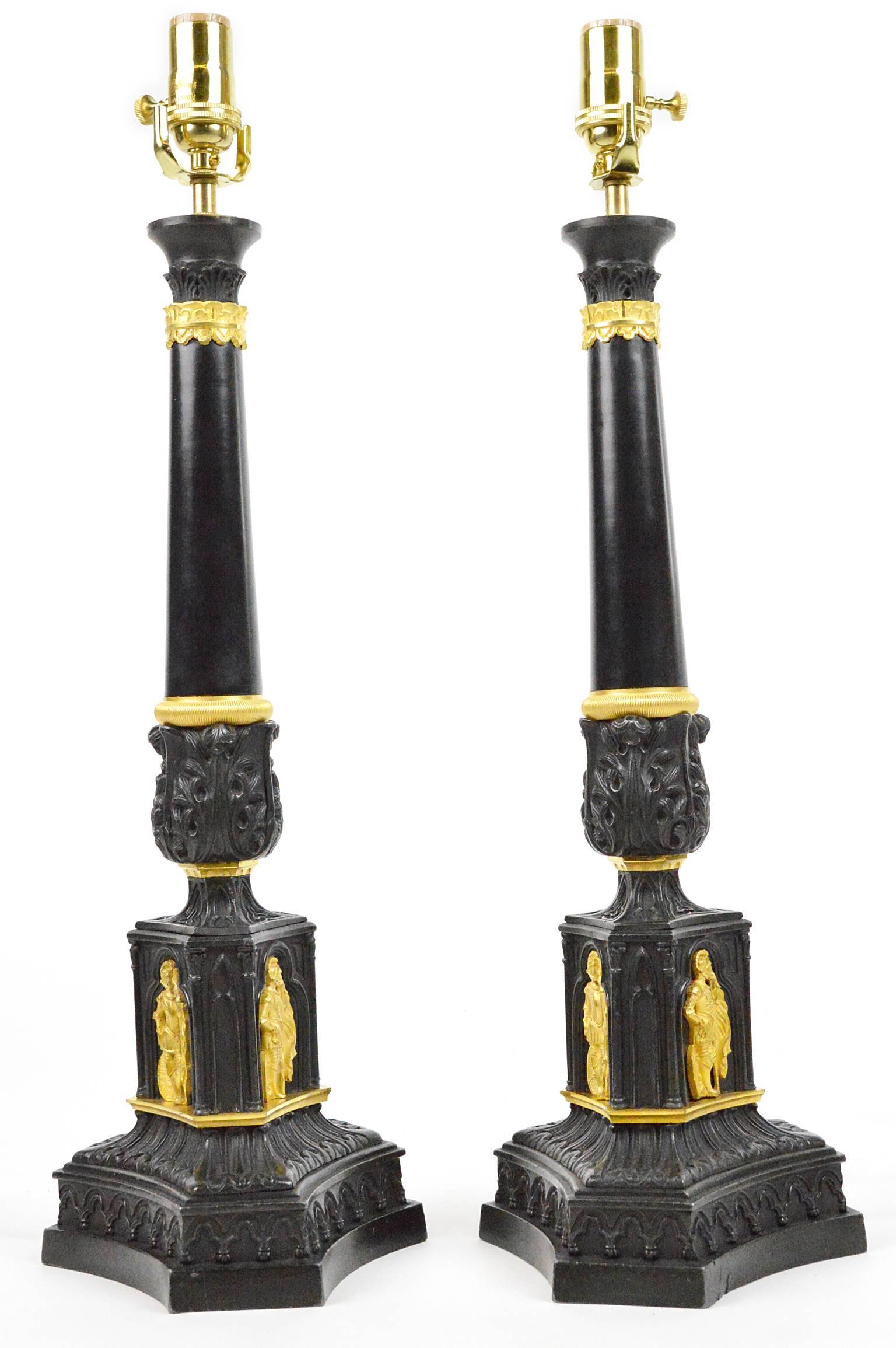 Pair French Empire patinated gilt bronze mounted column lamps with gilt figurals on tripartite base.
23.75