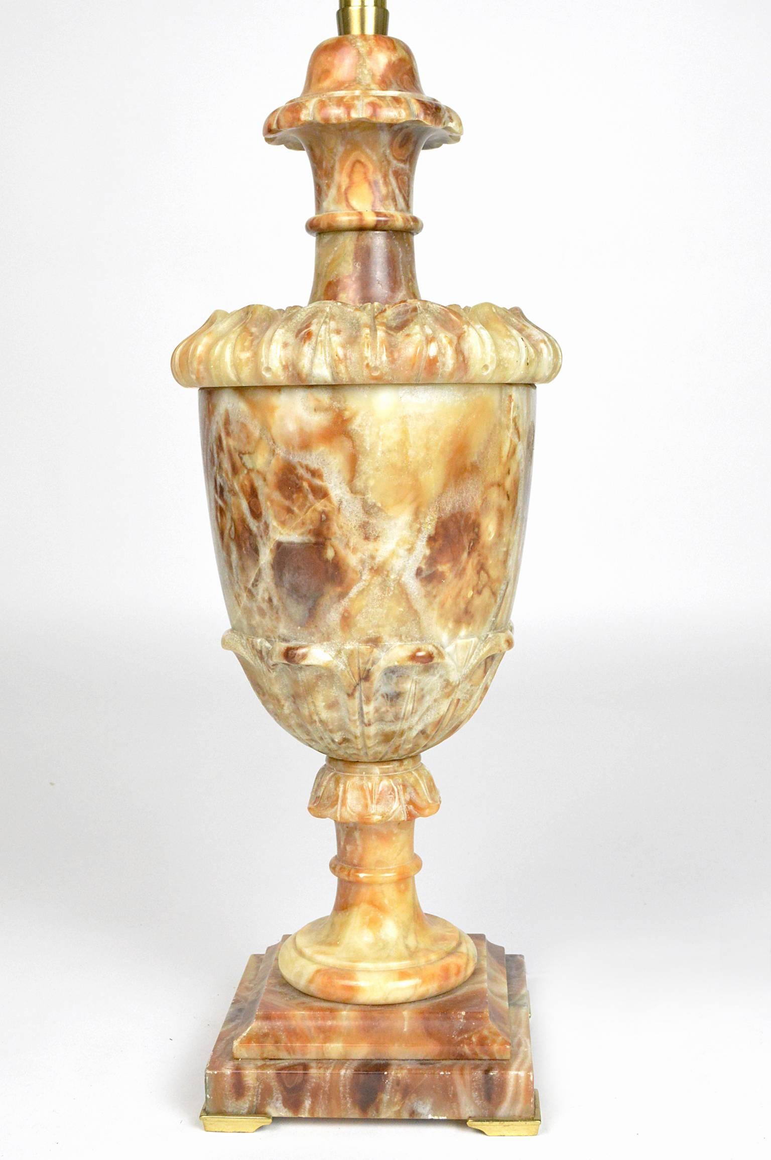 Carved alabaster vase-form lamp with carved neoclassical details mounted on square alabaster plinth. Signed Marbro 32.25