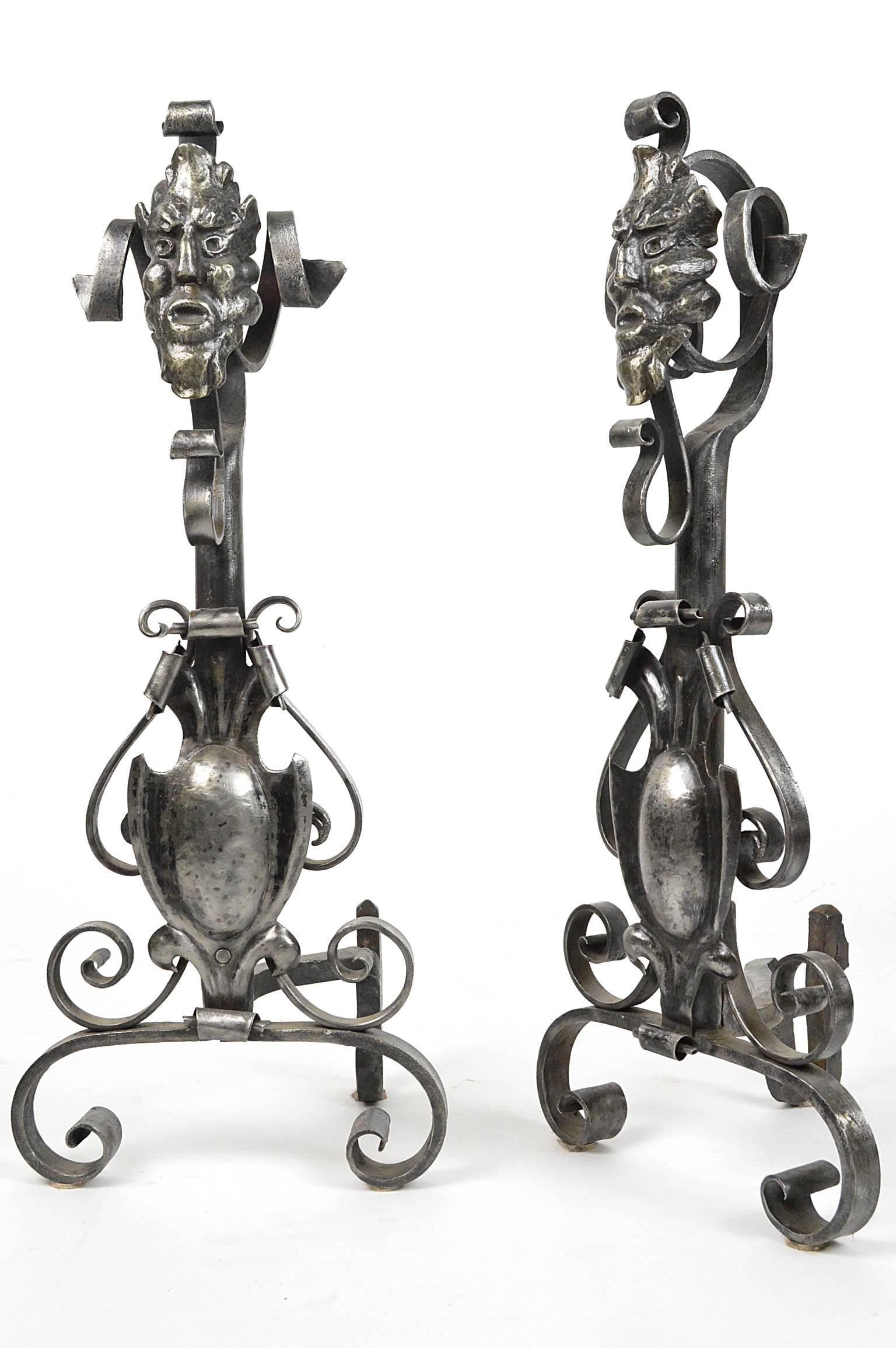 Pair of figural andirons in polished steel.