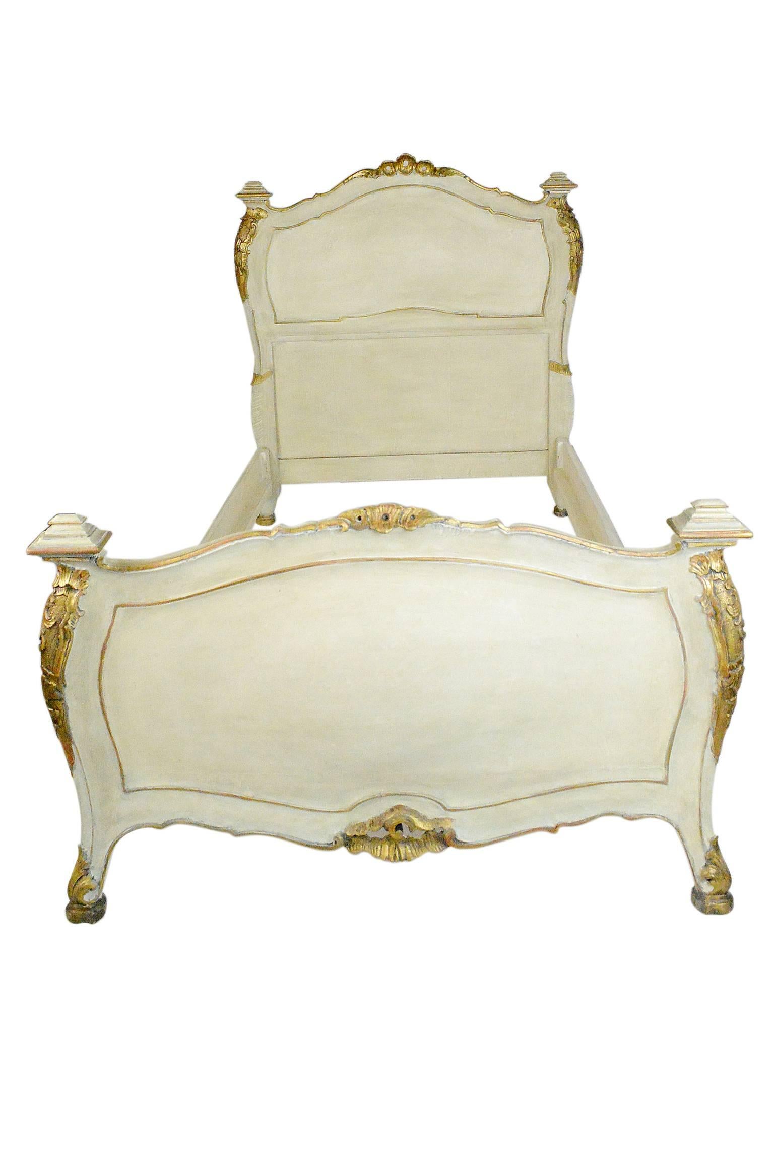 Fine pair of 19th century Venetian painted and giltwood twin beds.