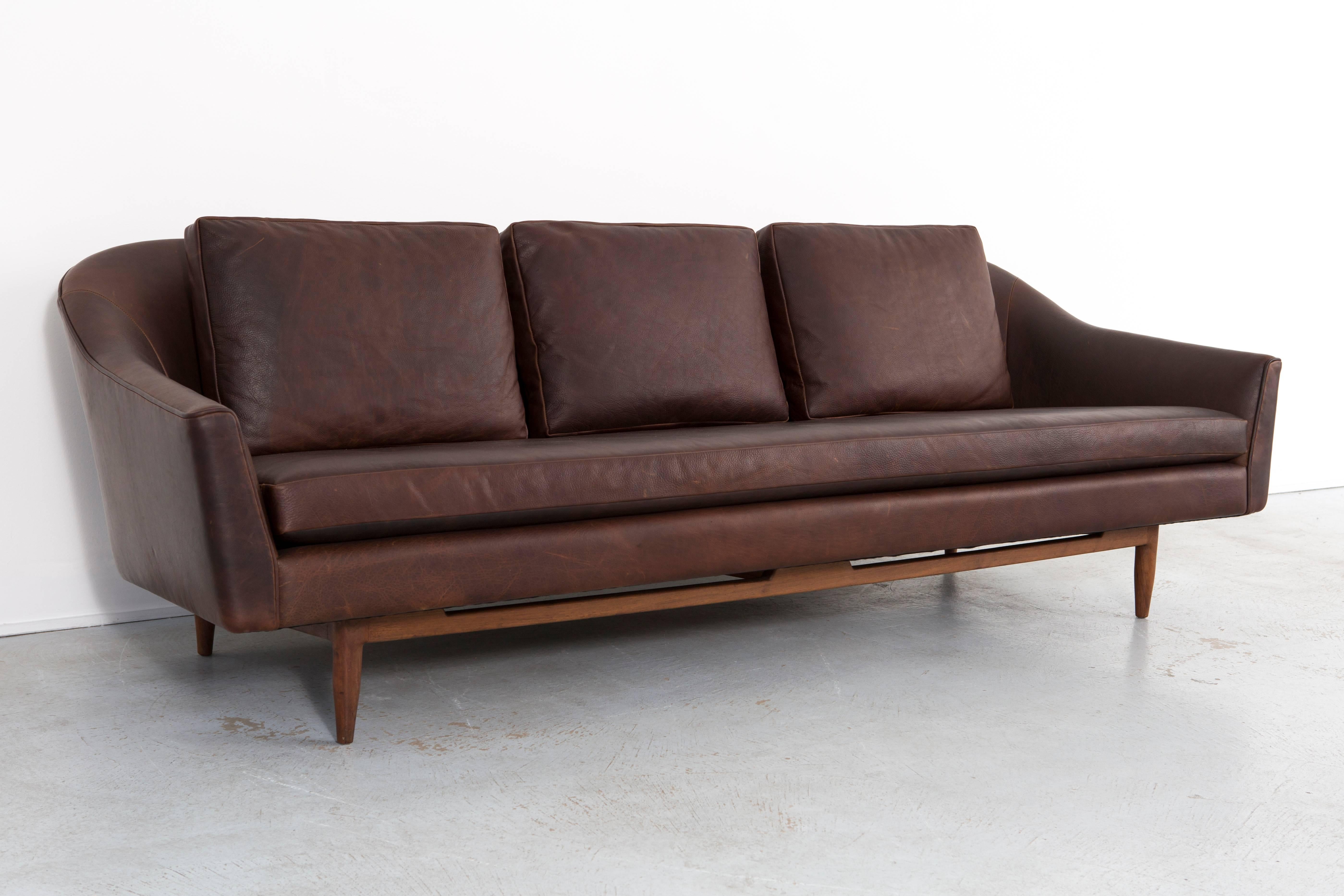 Model 2516 sofa

Designed by Jens Risom

C 1950s, Denmark

Reupholstered in leather

27" h x 91" w x 34½" d x seat 17½" h

Rare