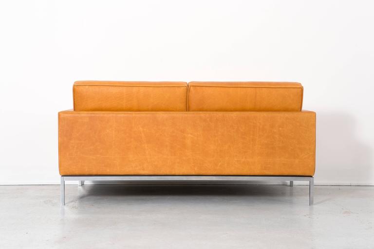 Two-seat sofa

Designed by Florence Knoll for Knoll

Reupholstered in leather

D 1954 / C 1970s, USA

30 ½” h x 62 ⅝”w x 32” d seat 18" h