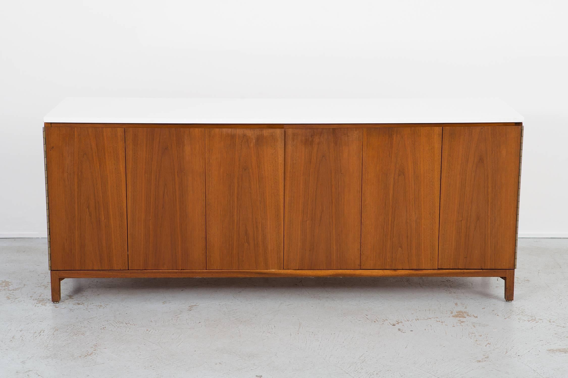 Credenza

designed by Paul McCobb for Calvin

USA, circa 1950s

mahogany and vitrolite

Measure: 29” H x 72