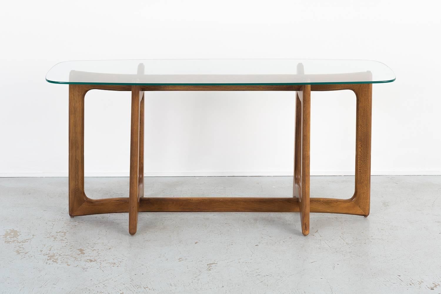 Console or sofa table

designed by Adrian Pearsall for Craft Associates

USA, circa 1960s

Walnut and glass

Measures: 26 ¼” H x 56 1/16” W x 18 1/16” D.