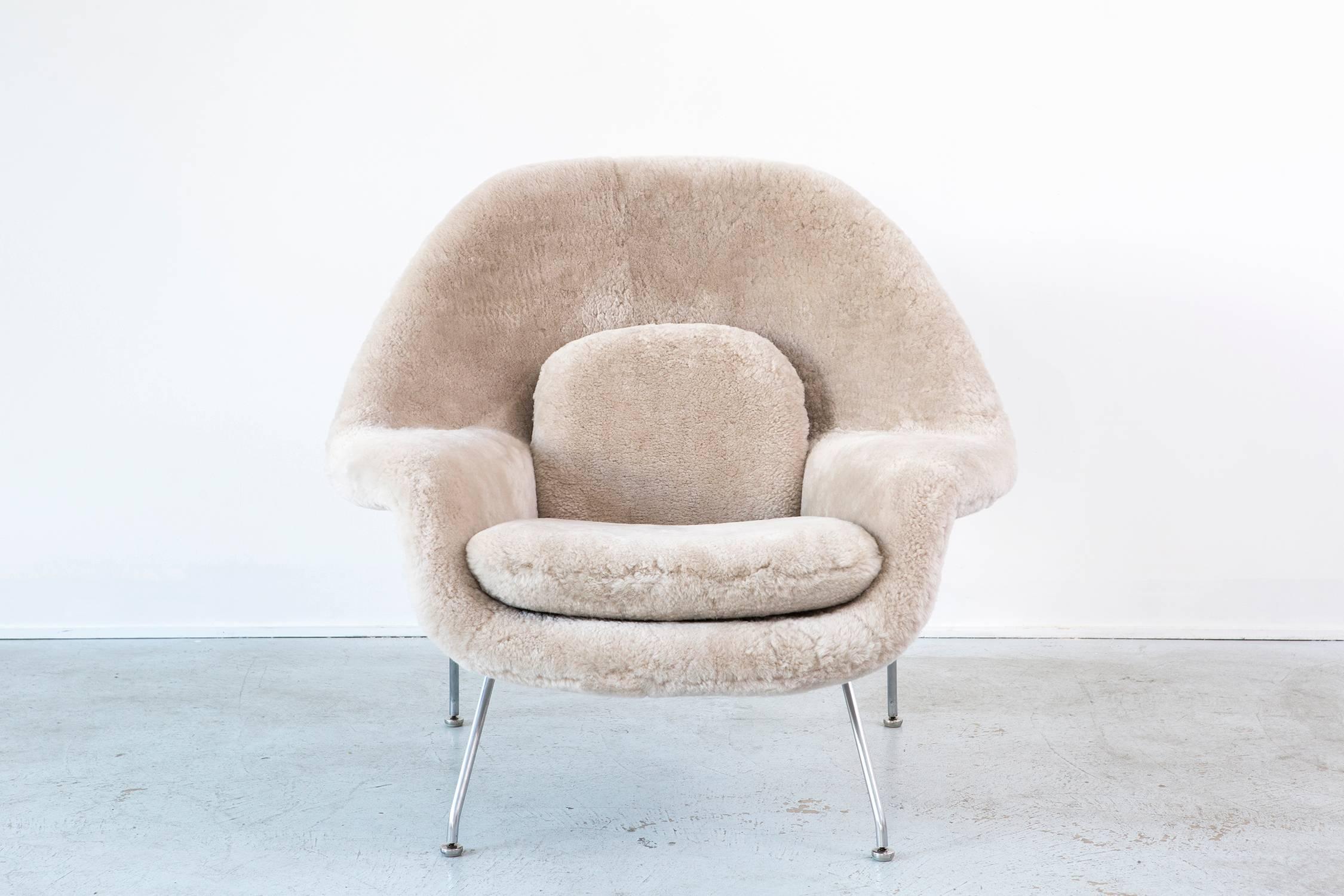 Womb chair

designed by Eero Saarinen for Knoll,

USA, d 1948 / circa 1960s.

Reupholstered in wool shearling and steel frame.

Measures: 35 ½