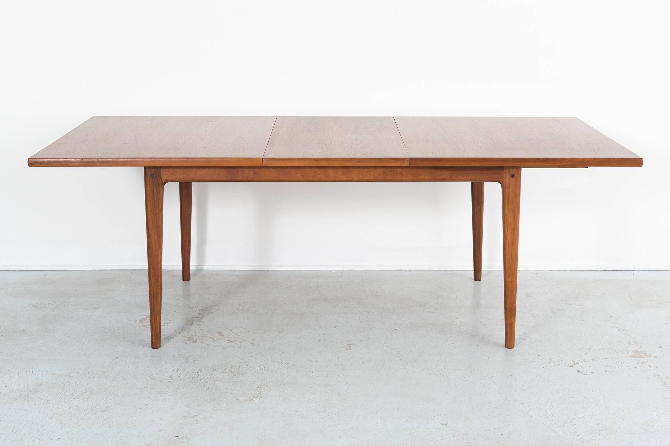 dining table

by Dux

Sweden, c 1960s

teak, includes two leaves + seats up to 10 people

not extended 28 5/16” h x 62 ⅞” w x 39 ¼” d

extended with one leaf 28 5/16” h x 82 ¼” w x 39 ¼” d

extended with two leaves 28 5/16” h x 102 ⅜” w x 39 ¼”