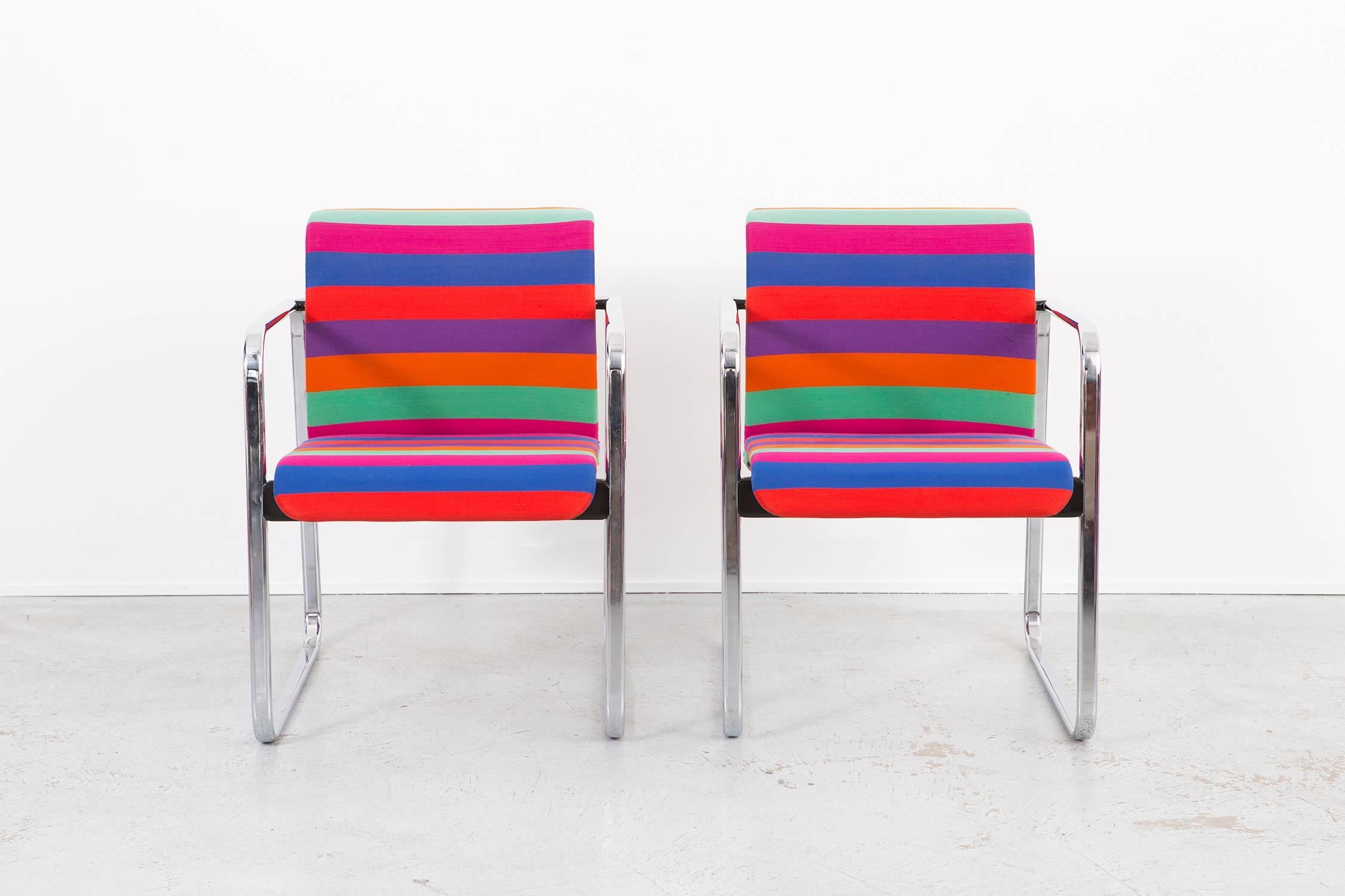 Set yourself apart in your new design firm/dining space with this set of stylistic fashion chairs, very attractive and unique colors.

Fabric by the renowned Alexander Girard whom worked with George Nelson and Charles and Ray Eames. Known for many