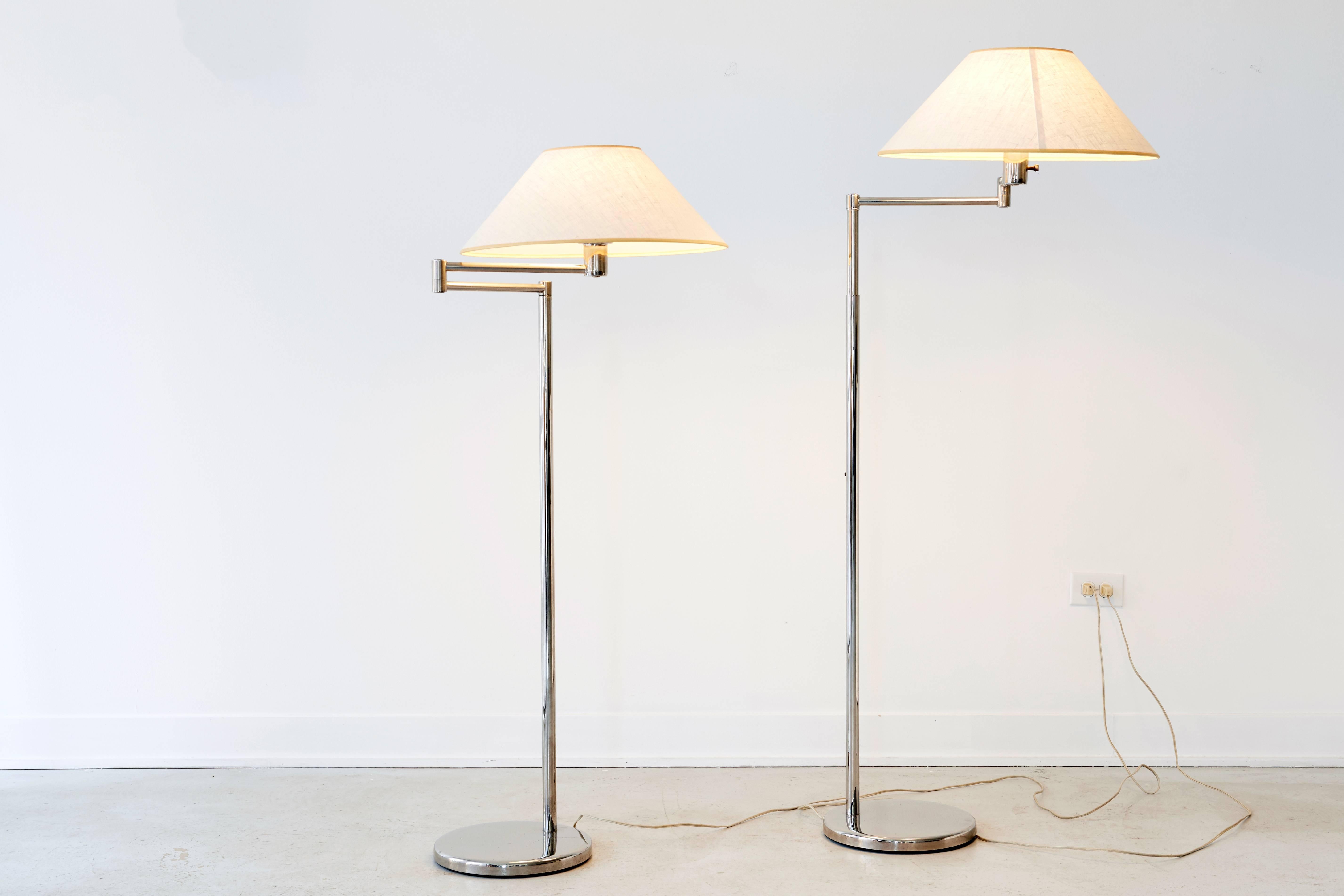 Pair of adjustable Walter Von Nessen swing arm lamps. Chrome lamps with original shades in excellent condition. Lamps adjust from 48''-58''.
