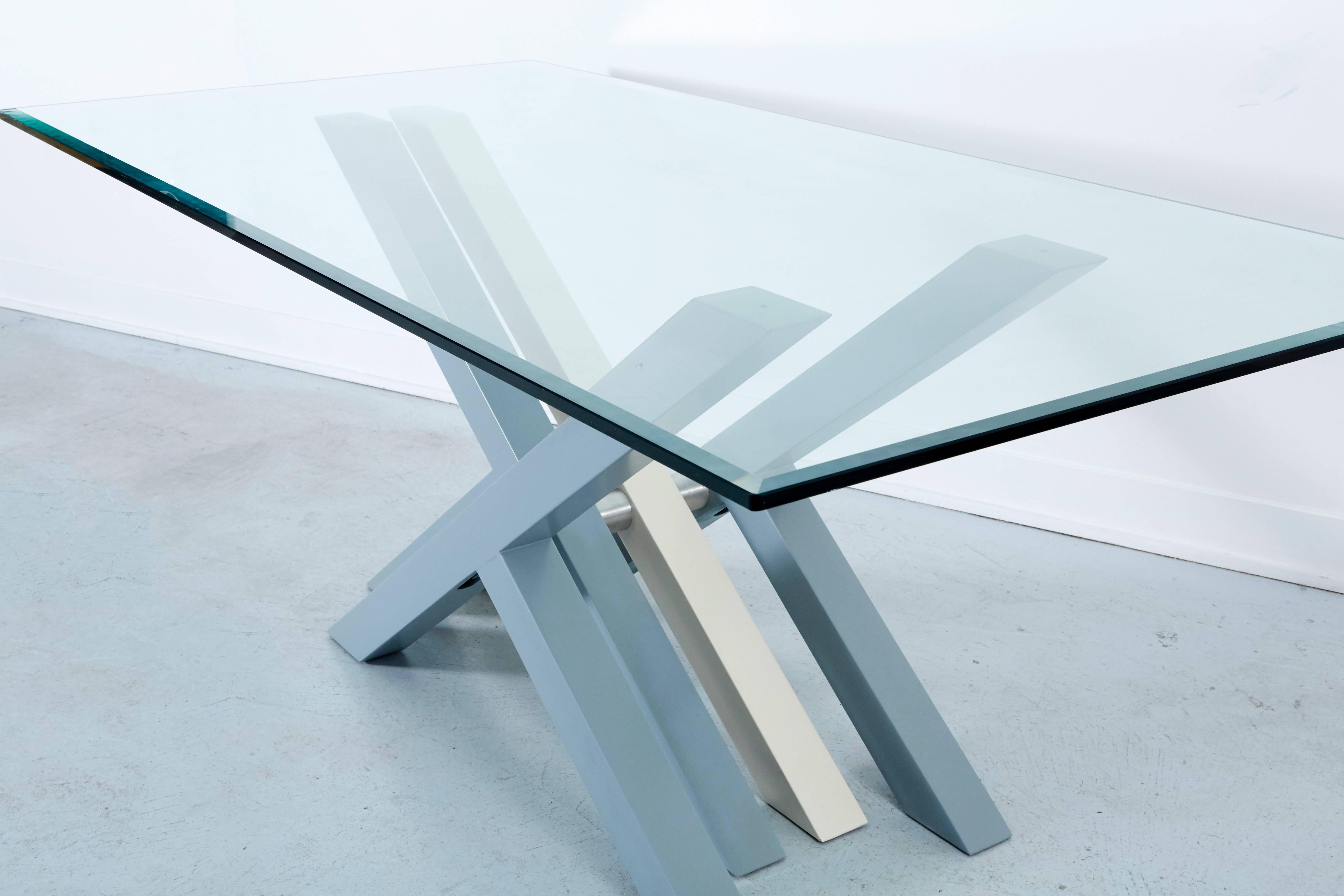 Italian dining table by Giovanni Offredi, circa 1975. A stunning Mid-Century Modern dining table with a lacquered wood and aluminum base and glass top.