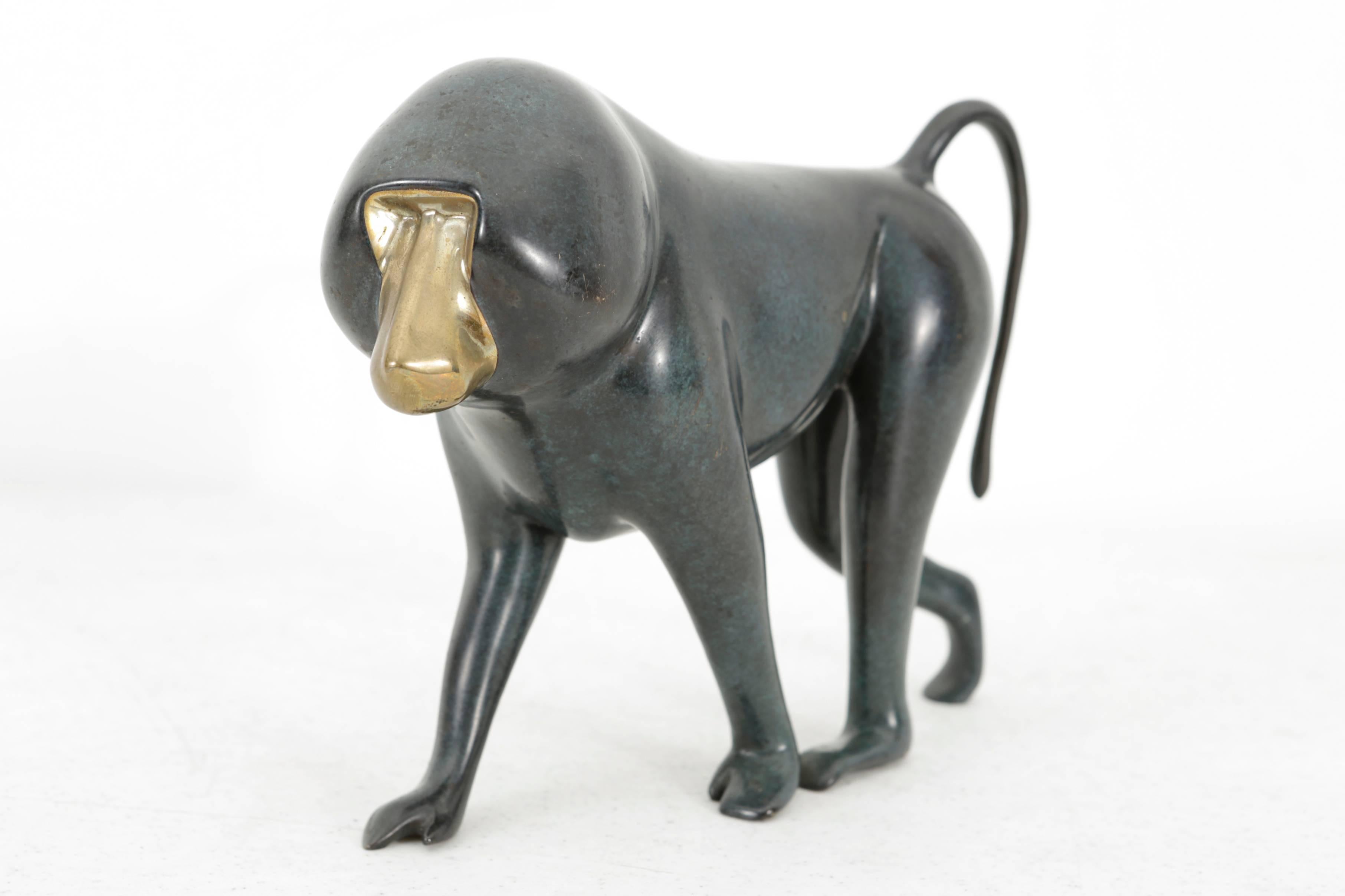 Set of two baboon sculptures by Loet Vanderveen. Bronze + patinated bronze. Signed and numbered 9 / 750 + 11 / 750.