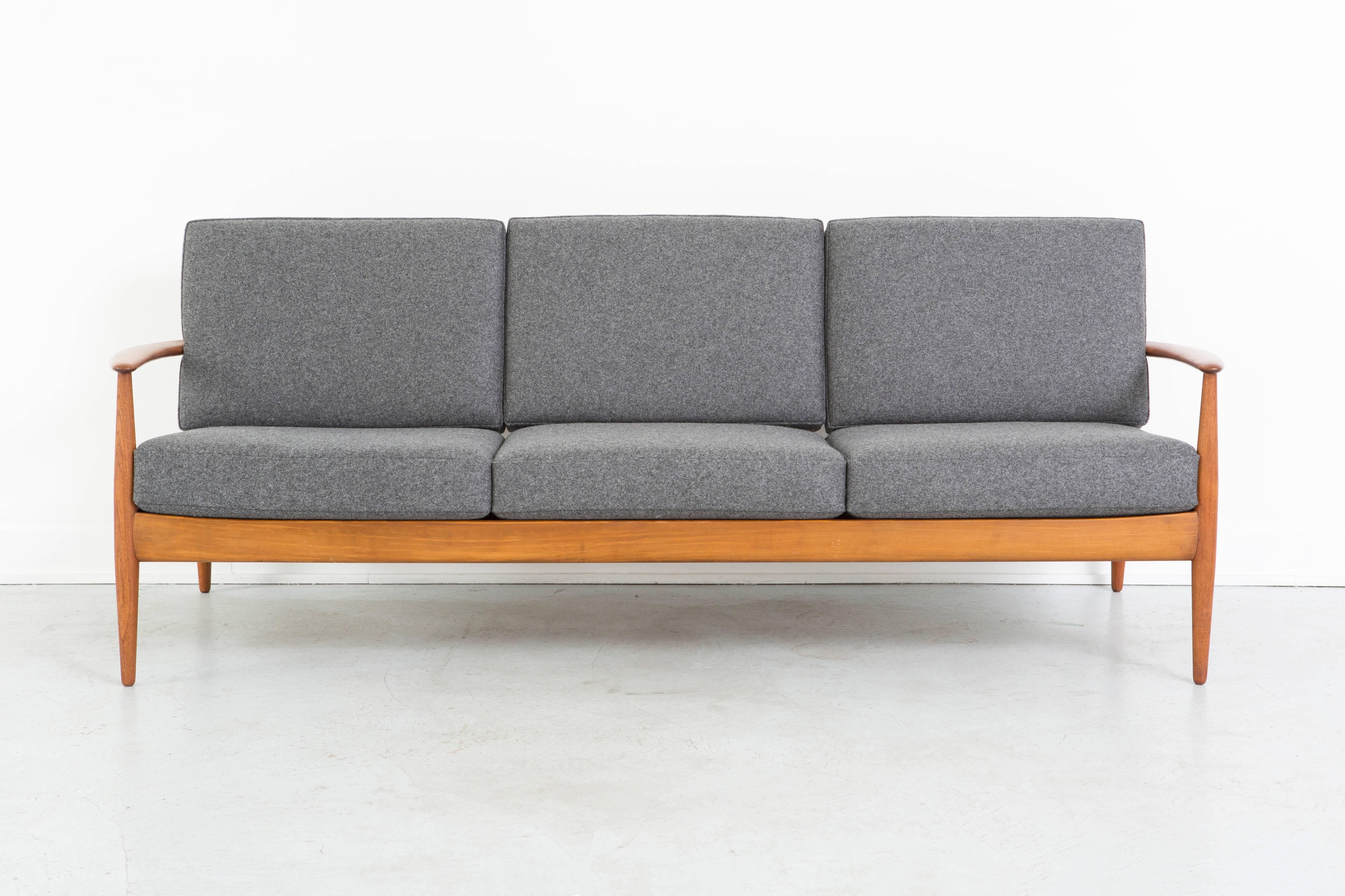 Sofa

Designed by Grete Jalk for France + Daverkosen 

Denmark, c 1950s

Reupholstered in Marharam wool felt + teak wood

30