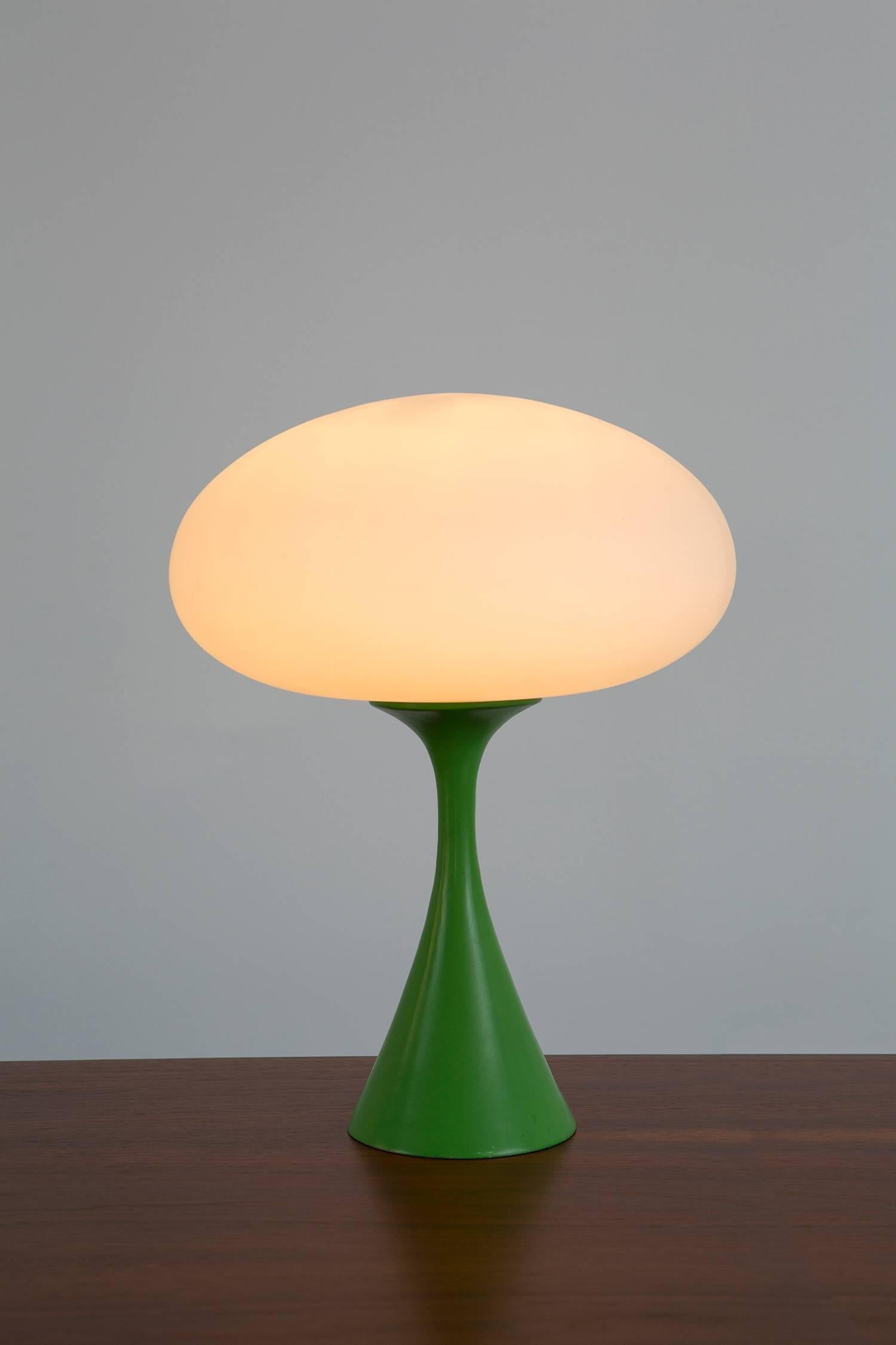 Mushroom lamp designed by Bill Curry for Laurel Lamp Co. Original frosted glass globe with a green enamel metal base.

 