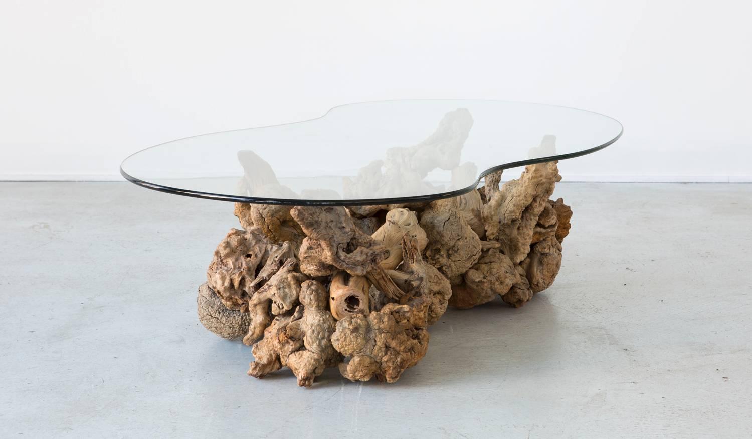 California driftwood table,

USA, circa 1970s.

Glass and driftwood.

Measures: 15 ⅝