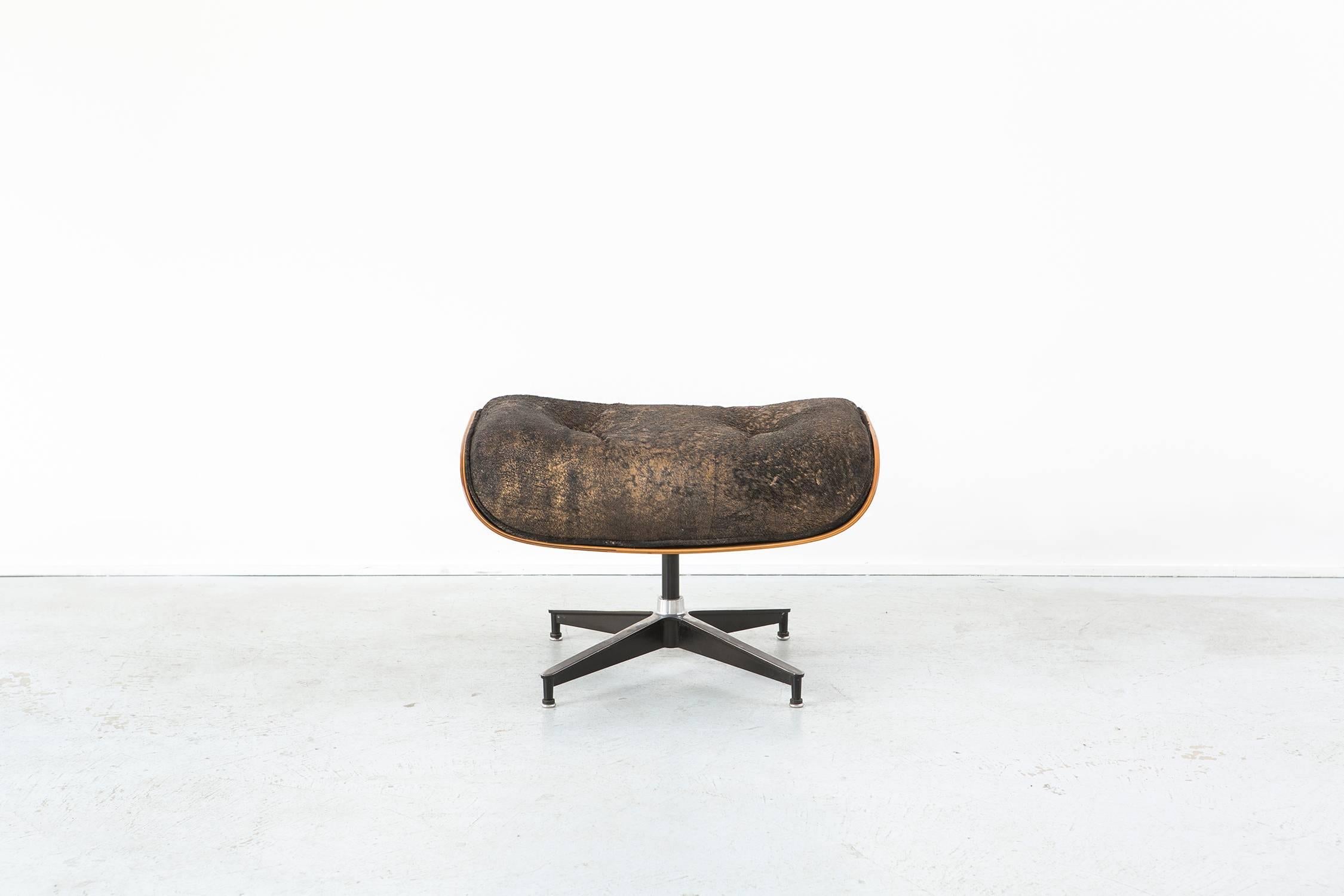 American Rosewood Eames Lounge Chair and Ottoman Reupholstered in Acid Washed Cowhide