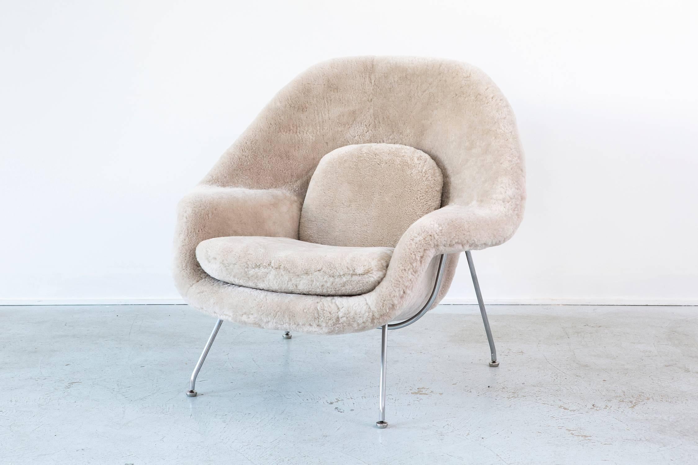 Womb chair

designed by Eero Saarinen for Knoll,

USA, d 1948 / circa 1960s.

Reupholstered in shearling and steel frame.

Measures: 35 ½