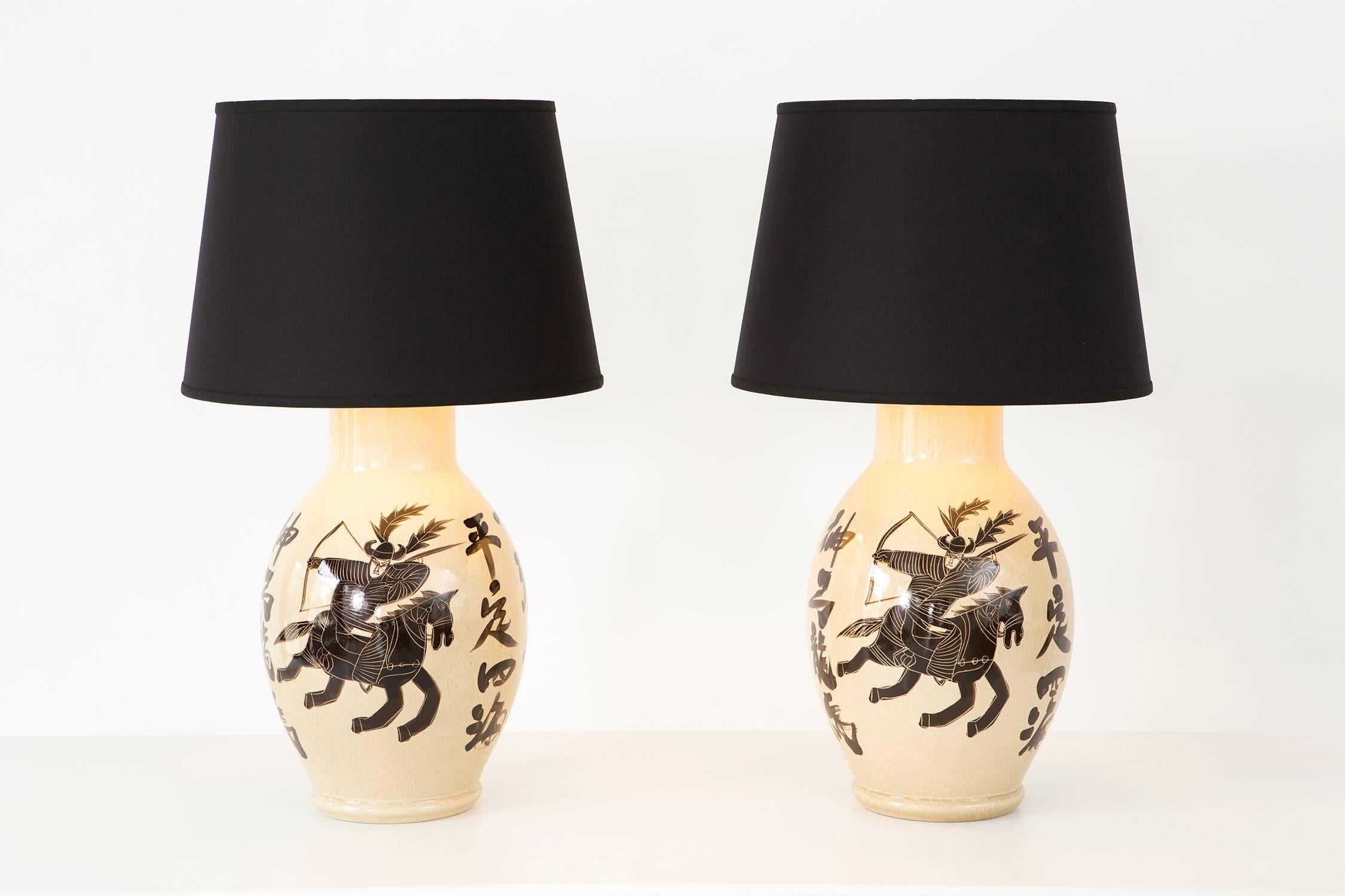 Set of chinoiserie lamps

Designer unknown

circa 1960s

Ceramic bases and linen shades

Measures: 32 ¾” H x 19 ?” W x 19 ?” D.

new linen drum shades

sold as a set