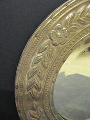 Miroir rond recouvert de métal