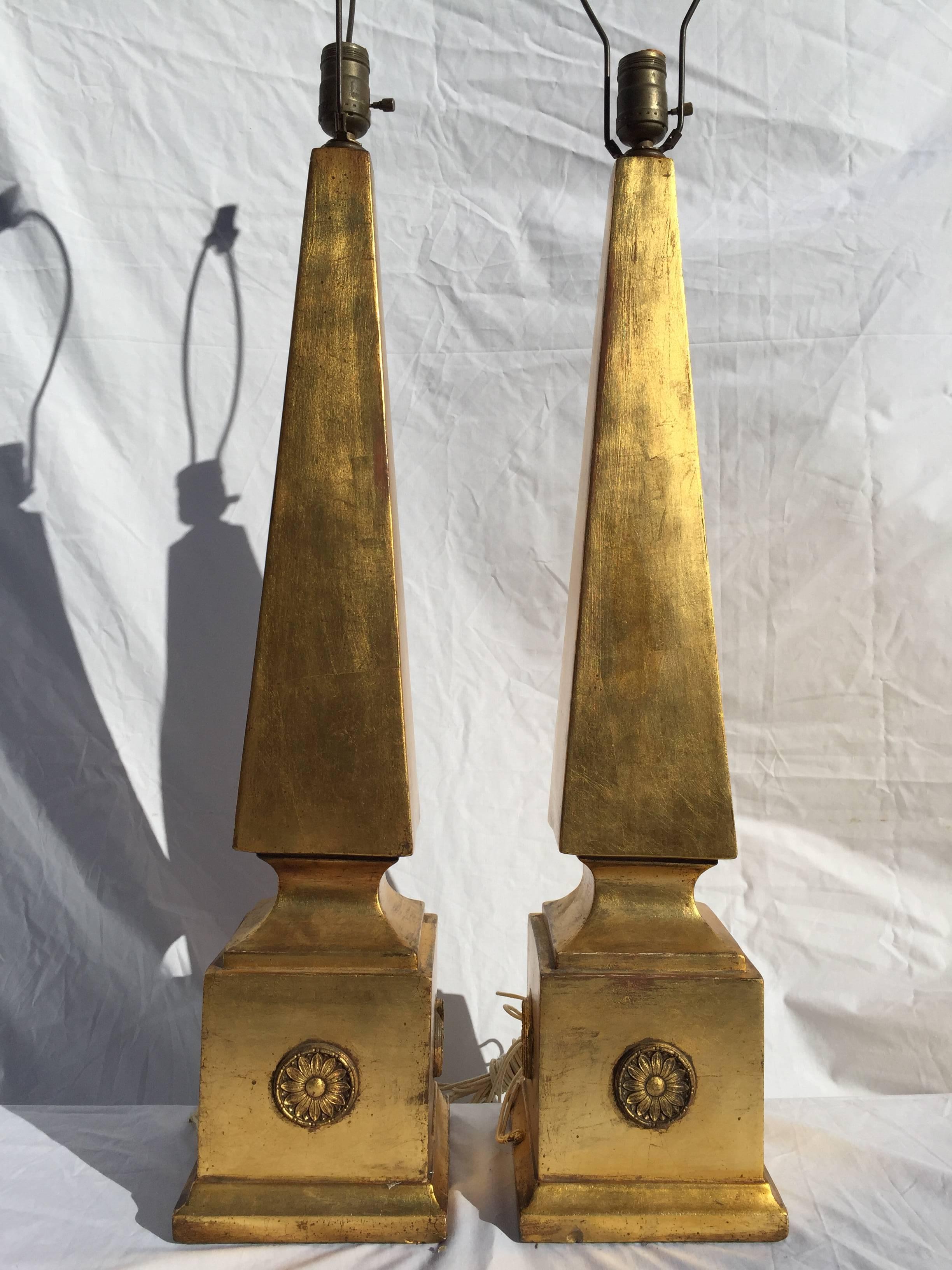 Pair of Monumental and Chic Gilt Obelisk Form Lamps with Sunflower Medallions 1