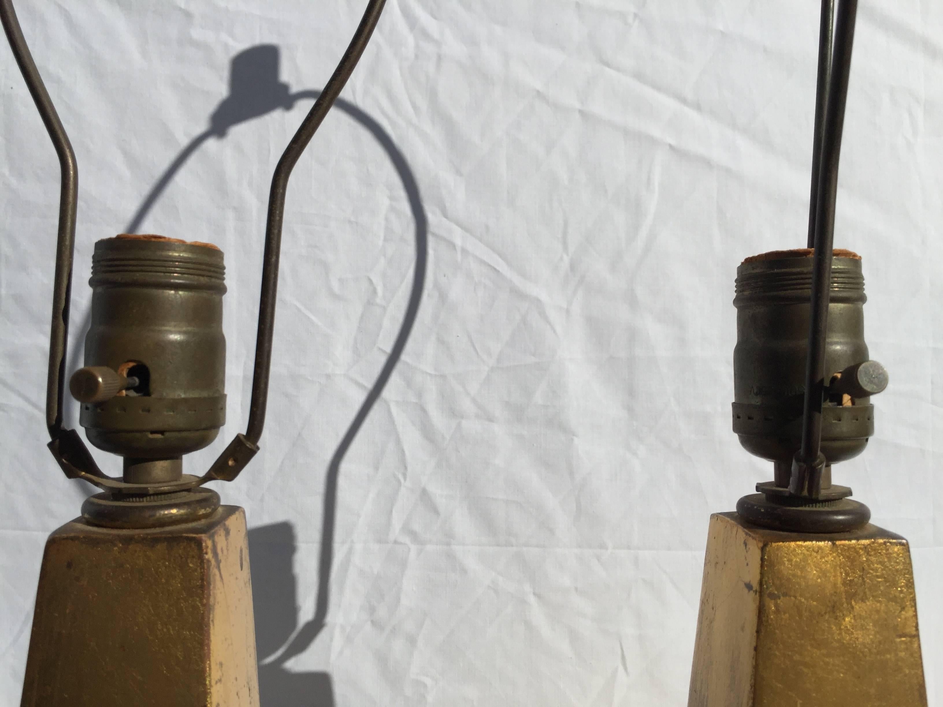 20th Century Pair of Monumental and Chic Gilt Obelisk Form Lamps with Sunflower Medallions