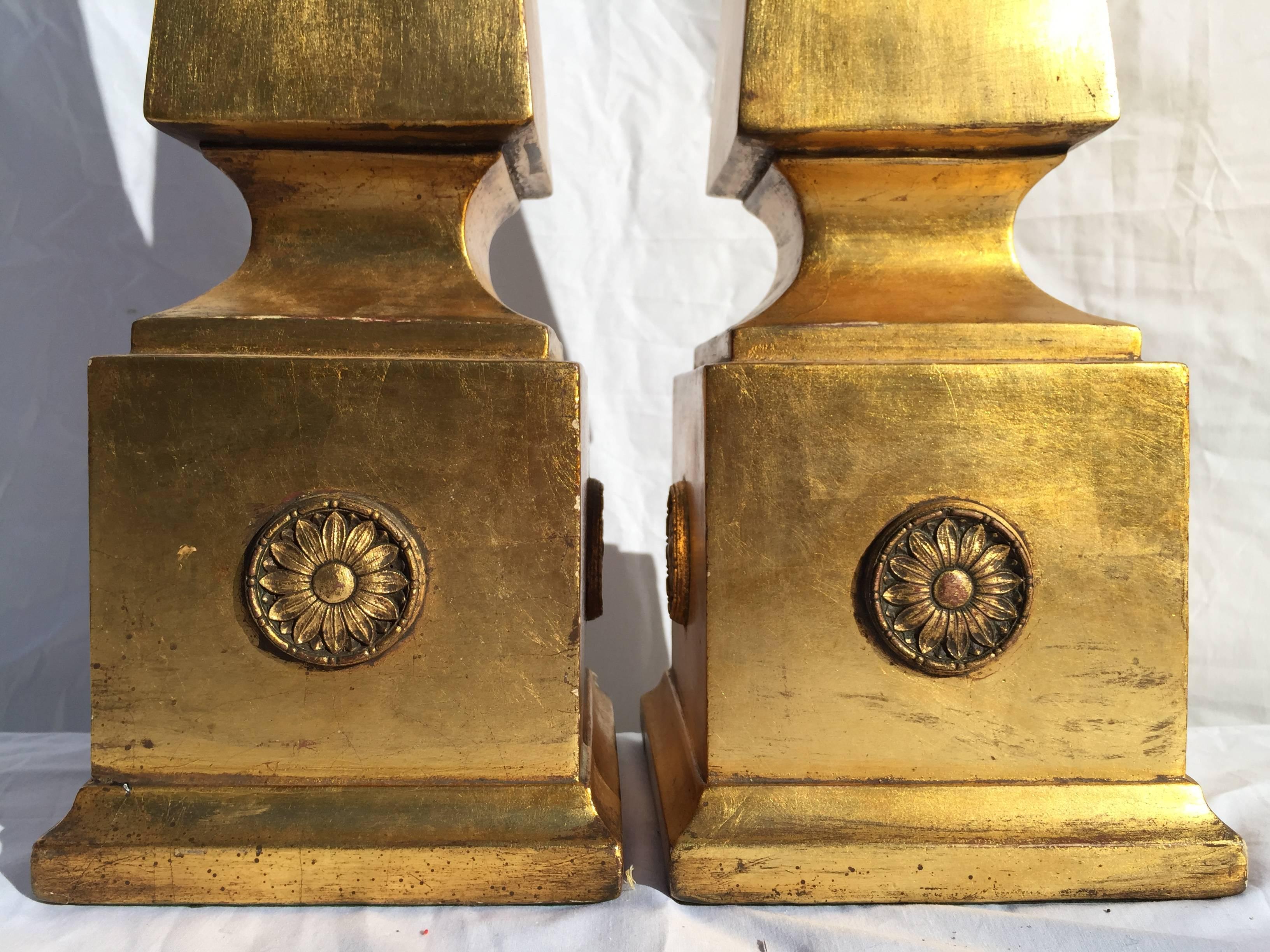 Plaster Pair of Monumental and Chic Gilt Obelisk Form Lamps with Sunflower Medallions