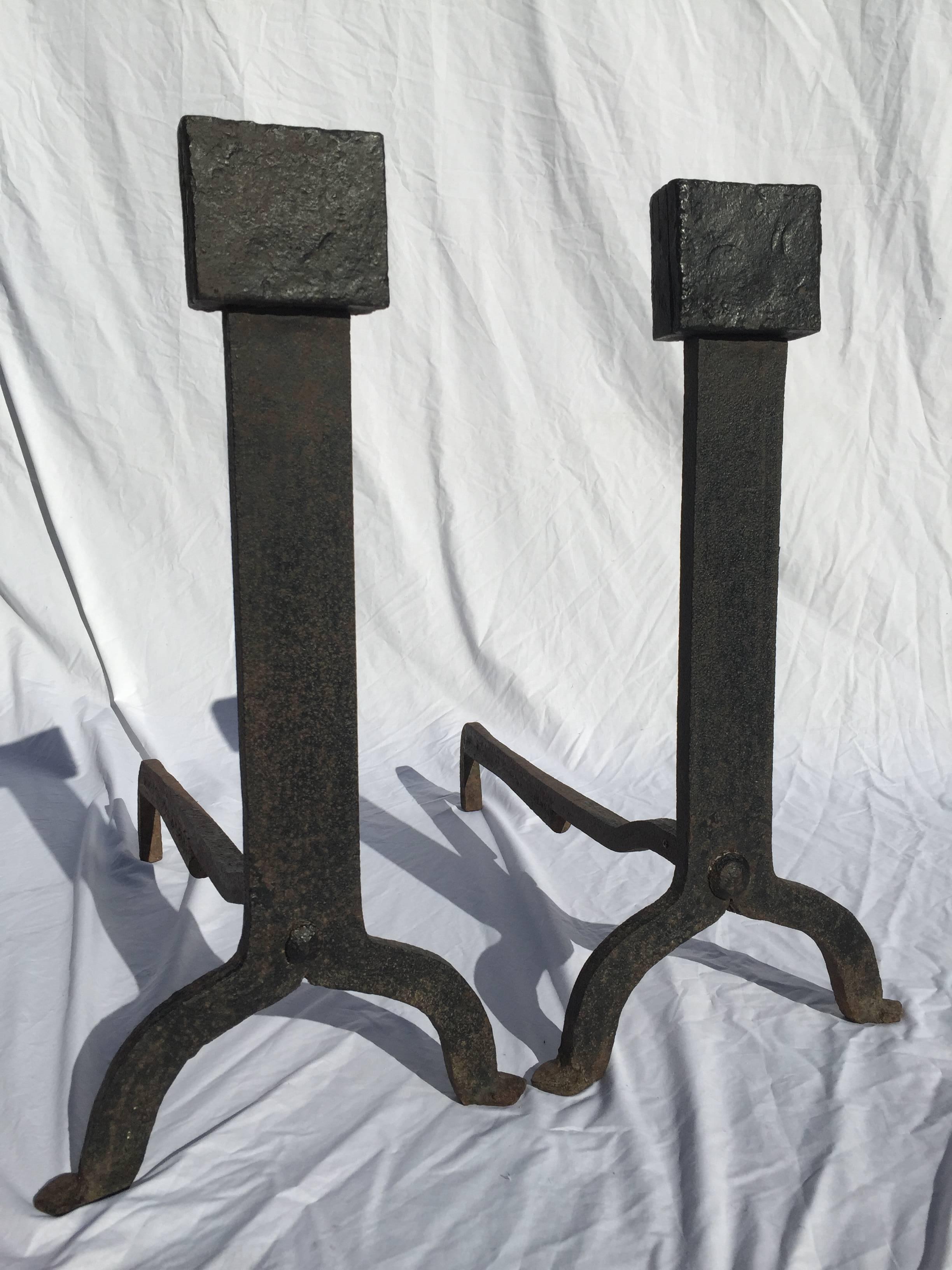 It really is all about the scale. And this pair has it. With bold, minimalist style that is both traditional and modern, antique and contemporary all at once, this pair of early 1800's (maybe even late 1700's) andirons is the perfect accessory to