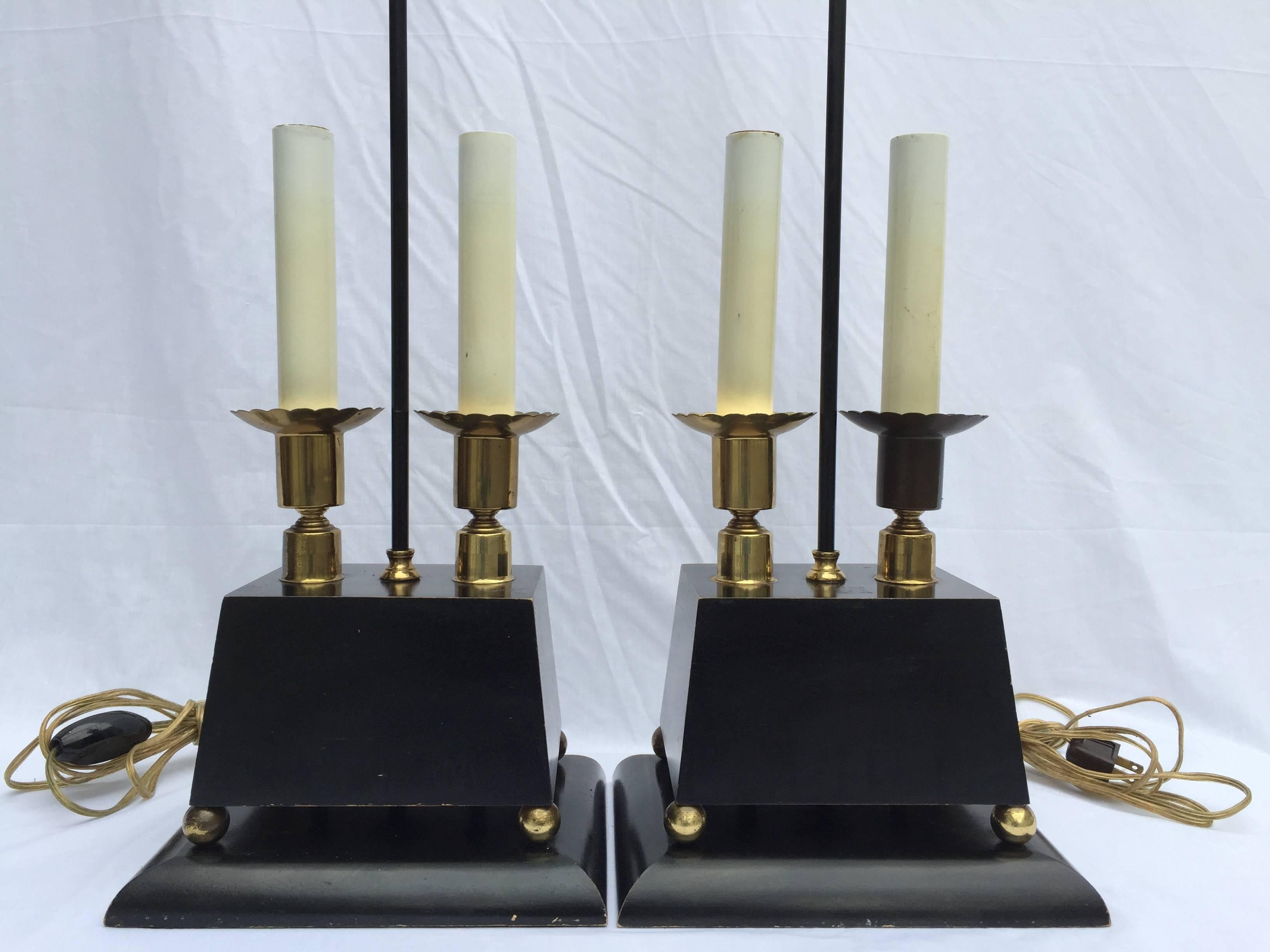 Ultra chic pair of lamps right here. Ready to light up your life. To give you hope to carry on. To light up your days and fill your nights with song (and more light). The lamps feature three dimensional trapezoid shaped wood bases delicately perched