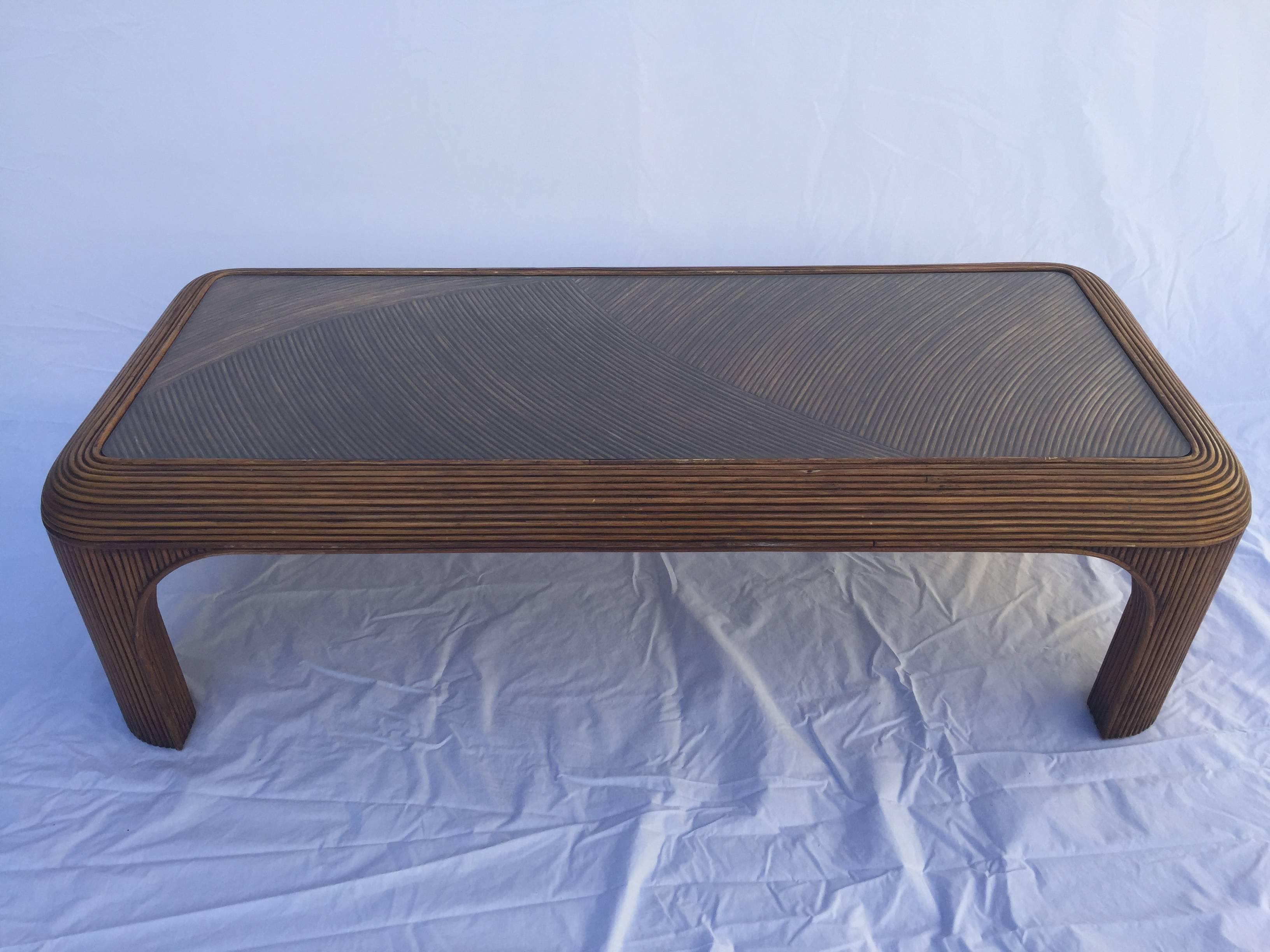This vintage coffee table is solidly constructed with row upon row of gorgeous split reed rattan bamboo. With rounded corners and a fantastically designed top, this coffee table is absolutely stunning. Dahling.  Oh, and if you're looking for the