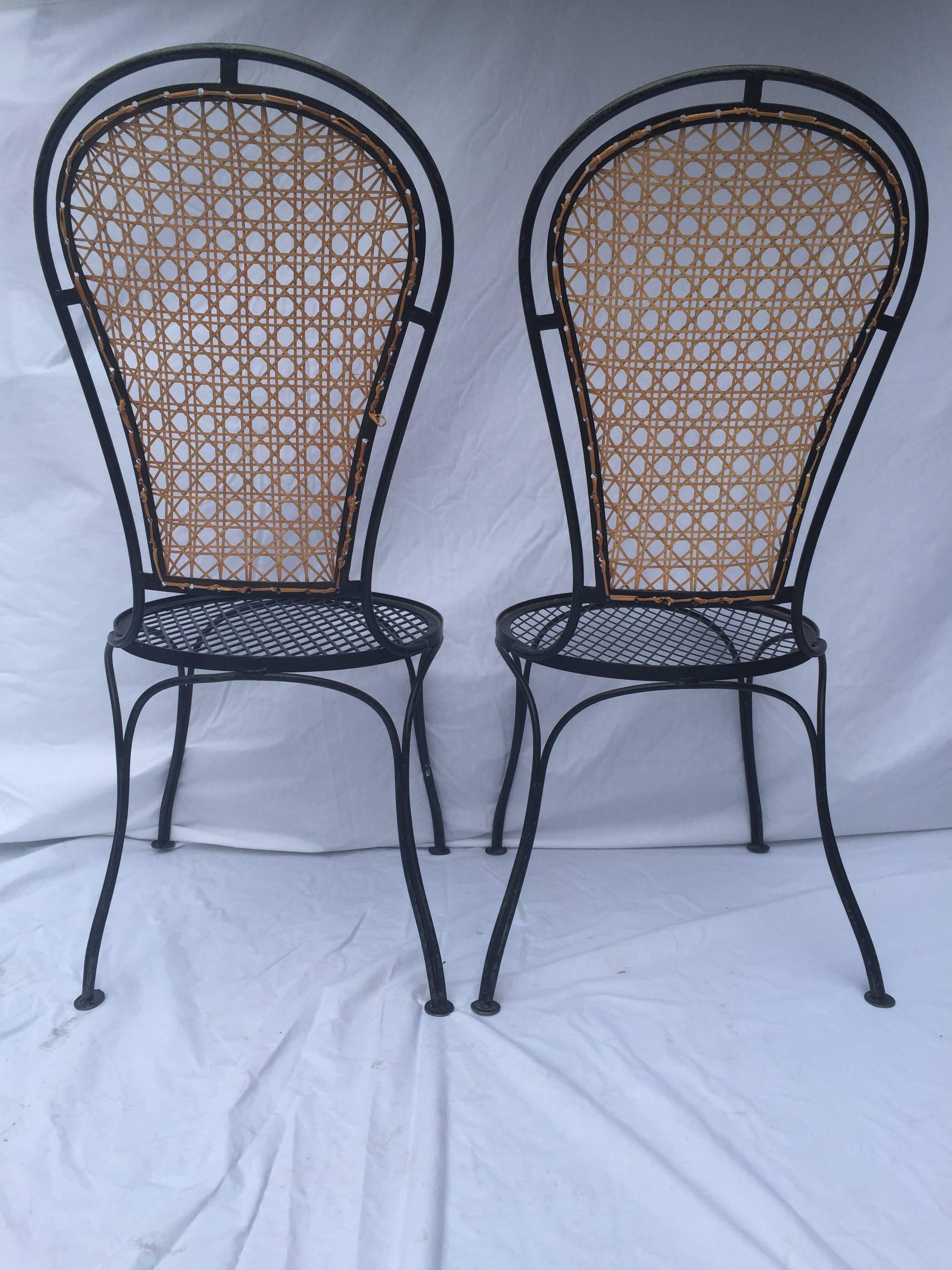 American Vintage Pair of Salterini-Esque Iron and Cane High Balloon Back Style Chairs For Sale