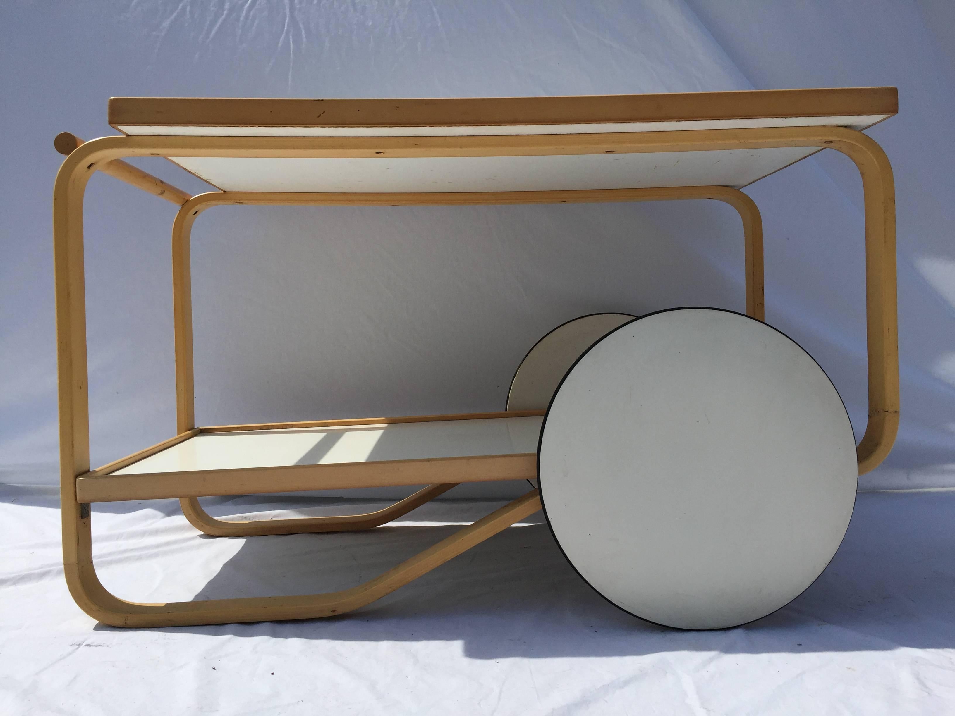 Tea for two and two for tea, me for you and you for me. Or rather, you for Alvar, but that didn't rhyme as well. This is the iconic tea trolley, #901, designed by Alvar Aalto for Artek, Finland in 1936. Made of bent birch and rubber (on the wheels)