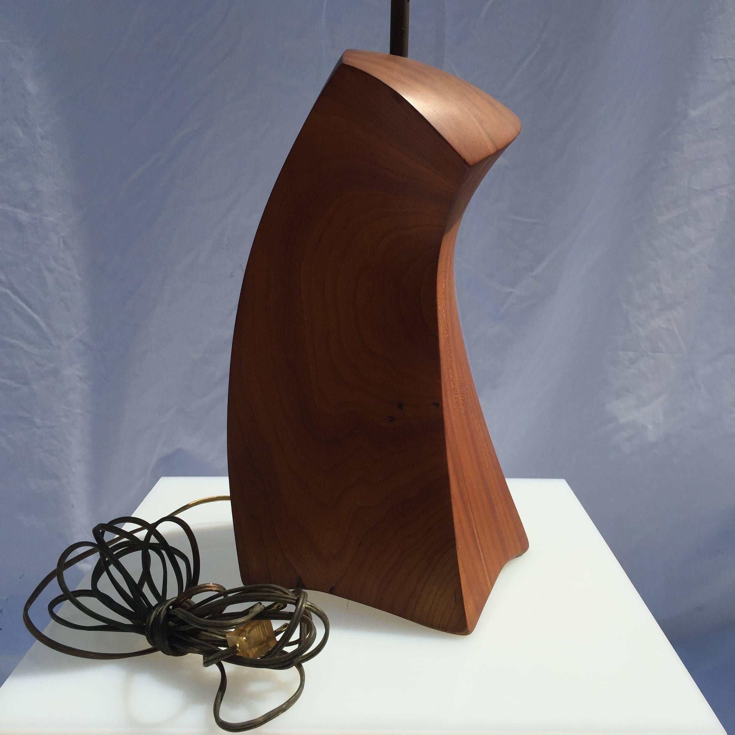 A beautifully hand-carved, hand finished Craft made table lamp by American woodworker Eric Sprenger. Signed on the side. Lamp measures 15.5 inches high to the top of the carving.

Eric Sprenger comments about his work, for over 30 years I have