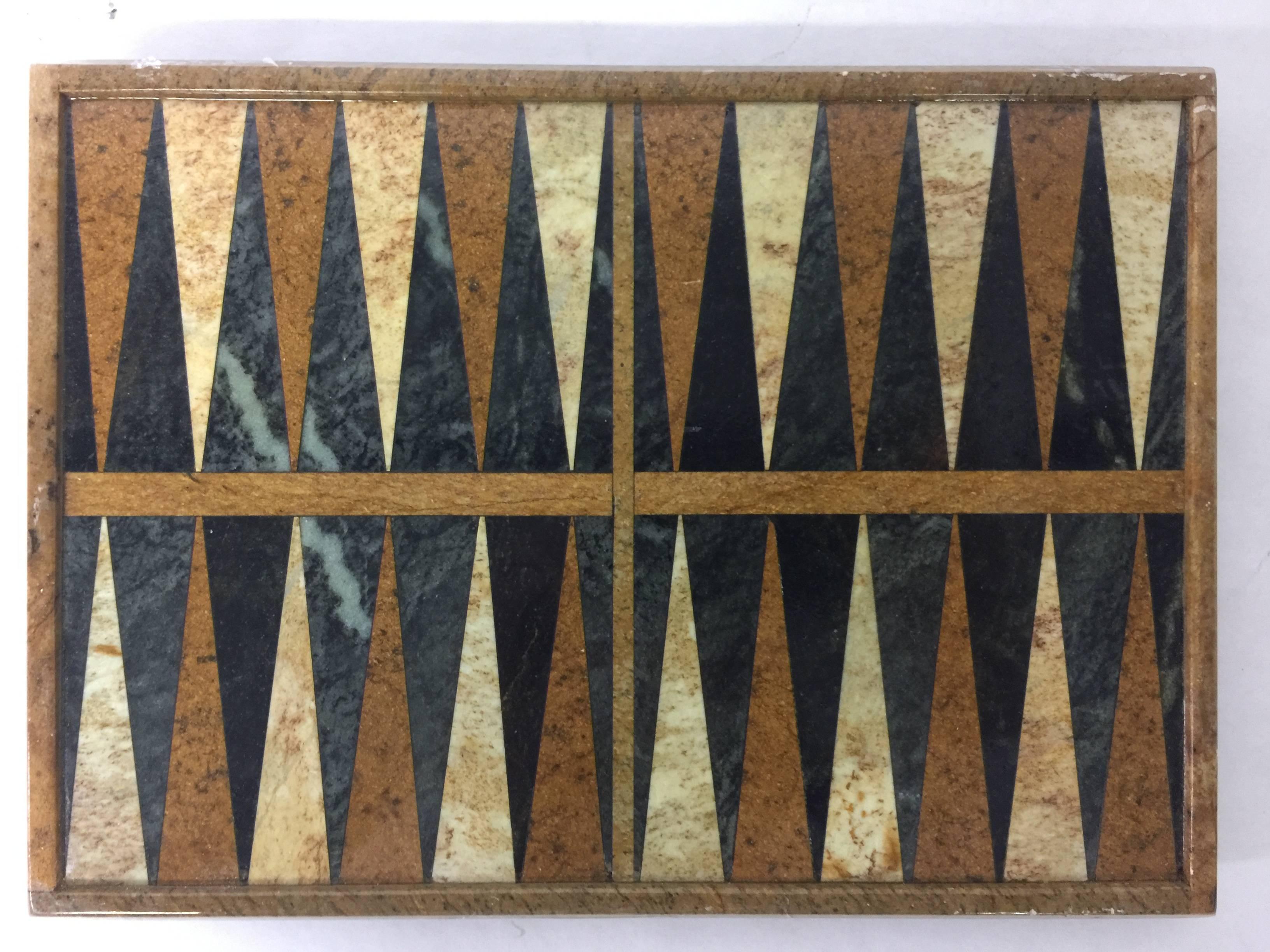 Game on. This vintage Brazilian backgammon board has a mix of different marbles. Gorgeous!
