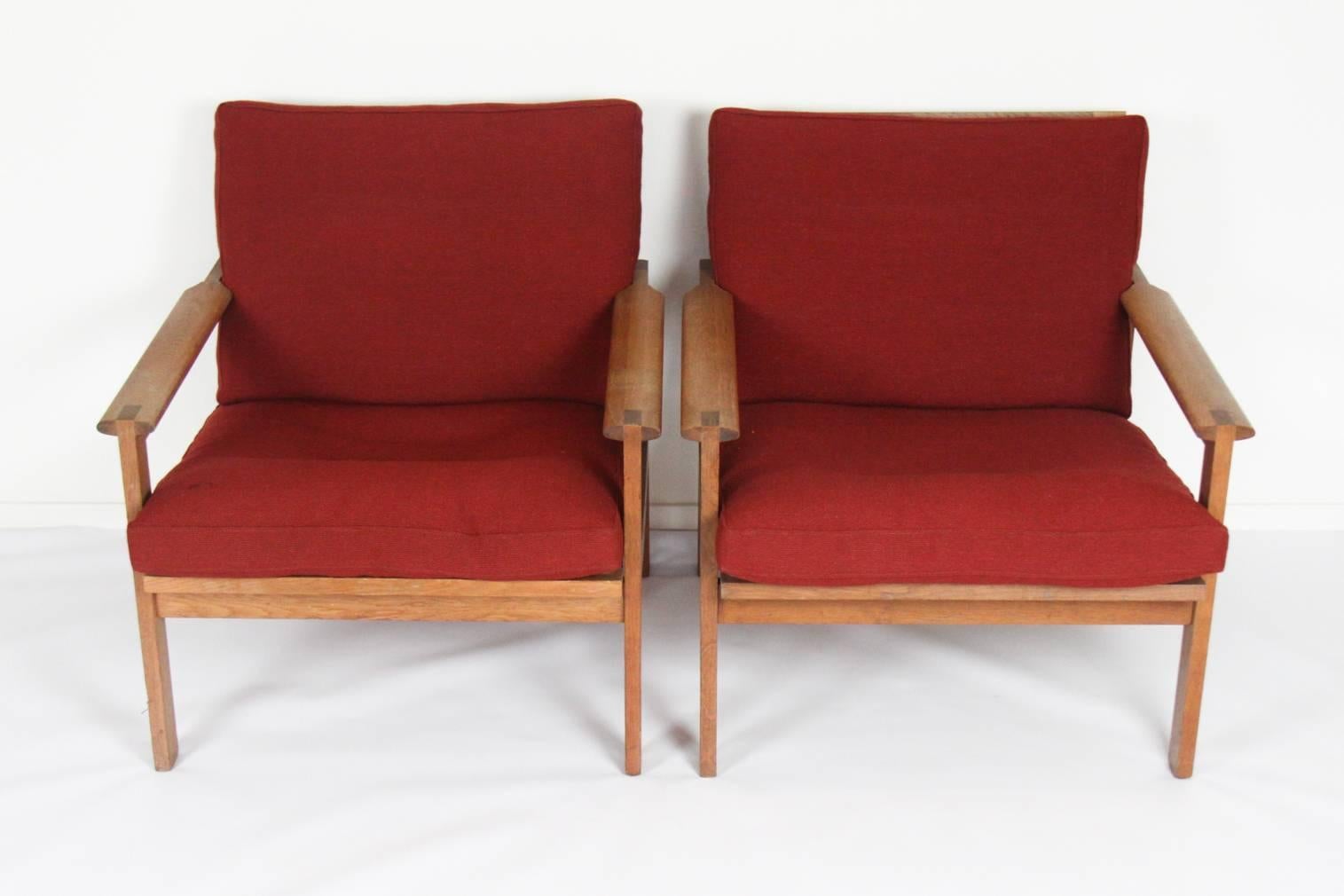 Pair of open-arm teak "Capella" armchairs by Illum Wikkelsø. Produced by Niels Eilersen, Denmark, 1959. The 'Capella' or Model 4 a beautifully simple armchair with some lovely touches. The Classic paddle arms with that lovely jointing so