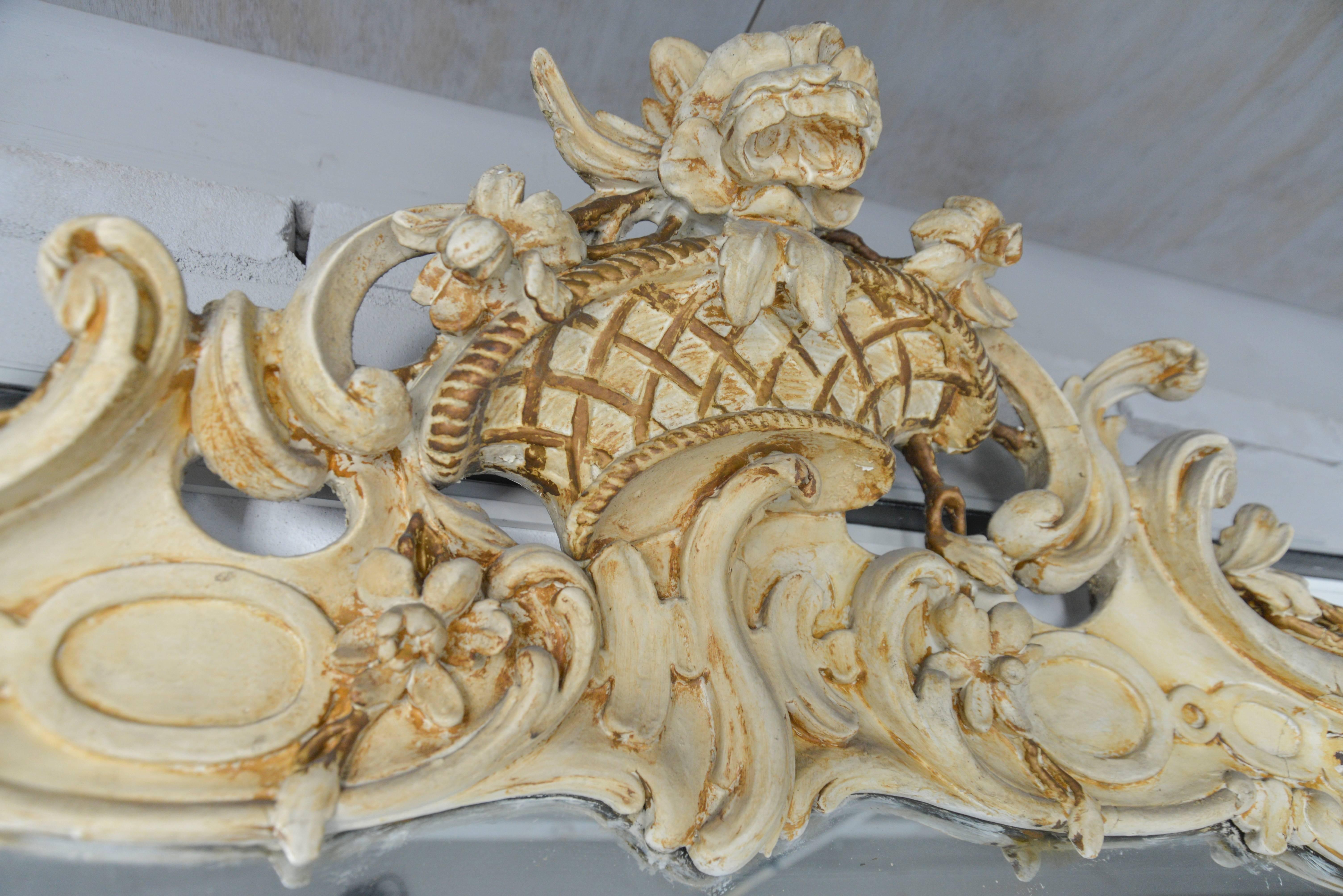 Very large Louis XV style carved and painted and gilded mirror with floral top crest en cartouche, 267 x 150 cm. France, ca. 1890