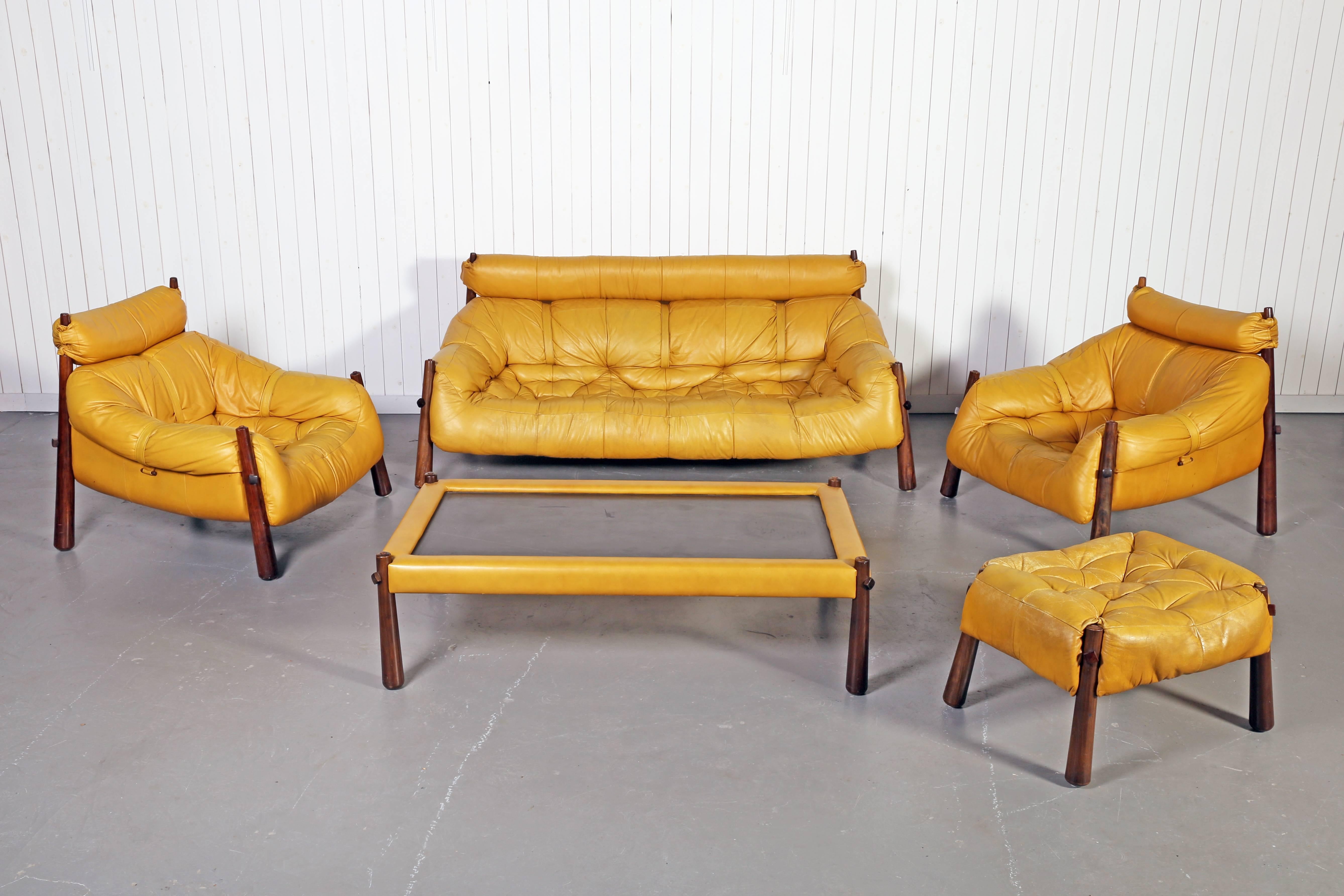 Note: Items individually available.

Very well kept five-piece leather and jacaranda wood Brazilian lounge set designed by Percival Lafer. The leather has a very nice soft feel and a warm patina. Structurally solid and ultra