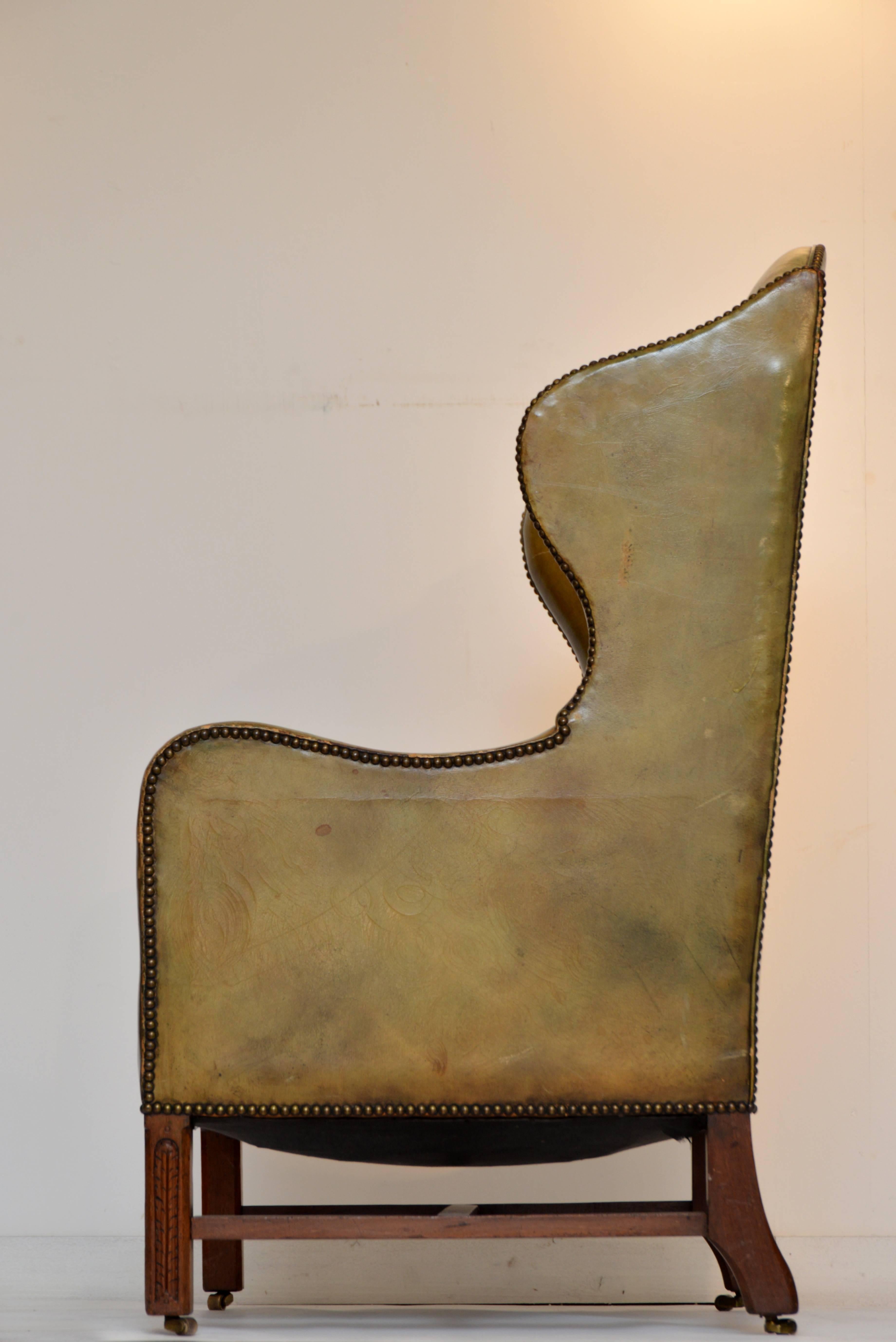 British Vintage Green Leather Wing Chair For Sale