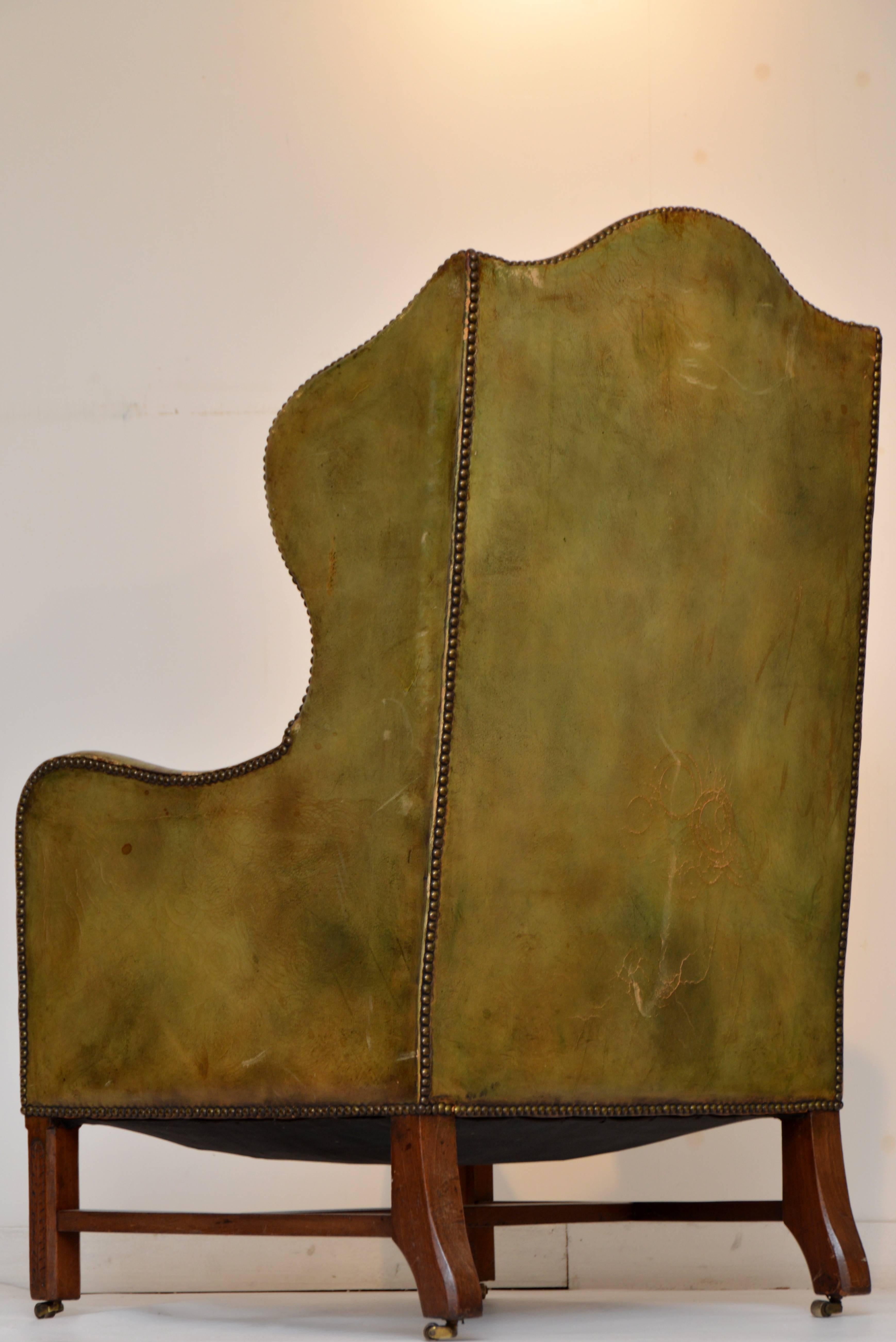 Hand-Crafted Vintage Green Leather Wing Chair For Sale