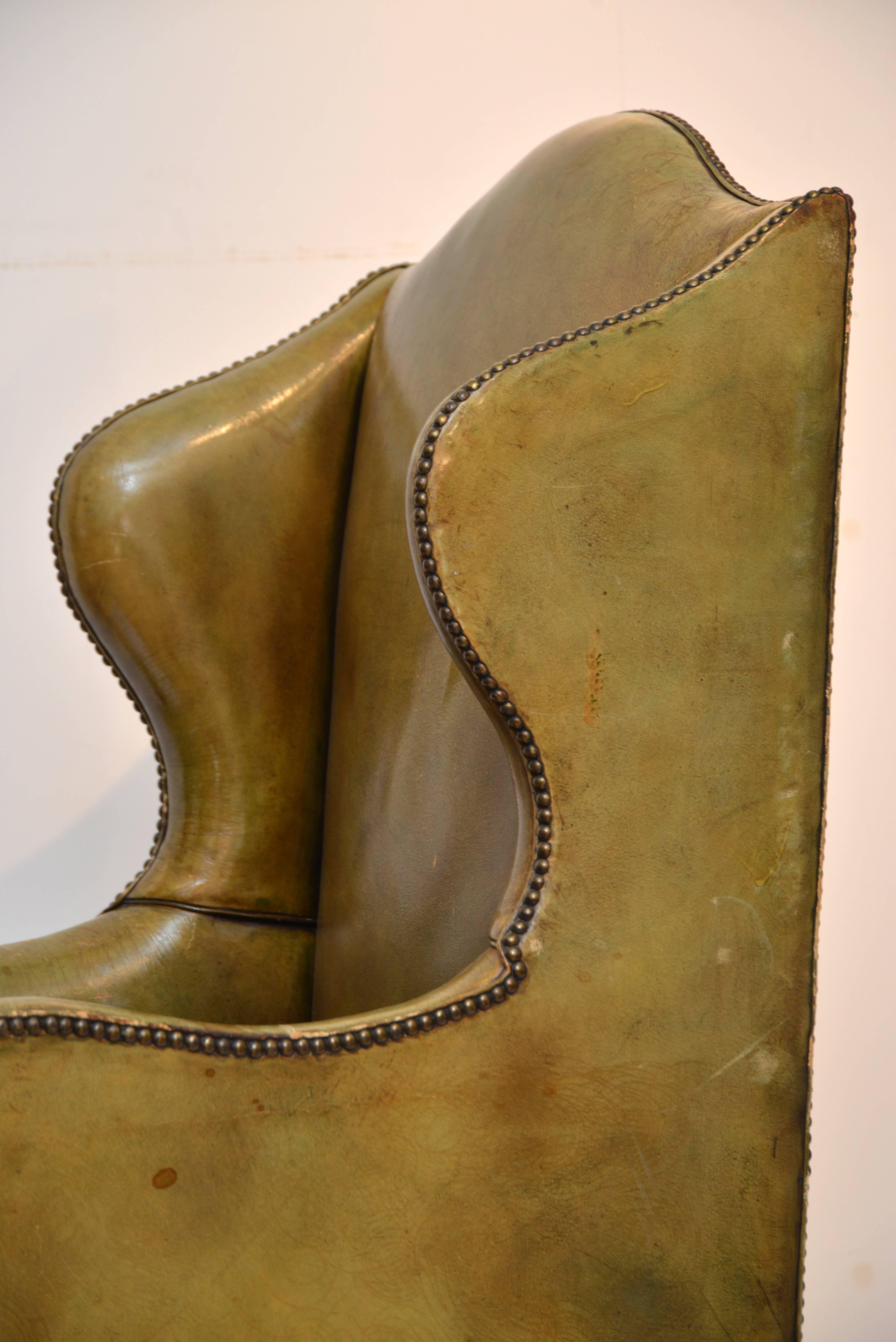 20th Century Vintage Green Leather Wing Chair For Sale
